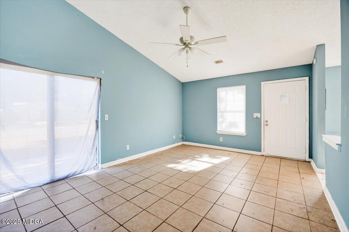 100 Mauldon Court Warner Robins, GA 31093 - Photo 4 of 20 a view of an empty room and window