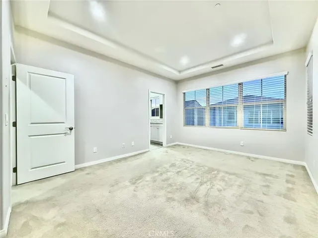 an empty room with cabinet