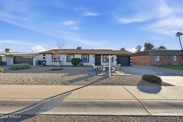 a view of a house with entertaining space