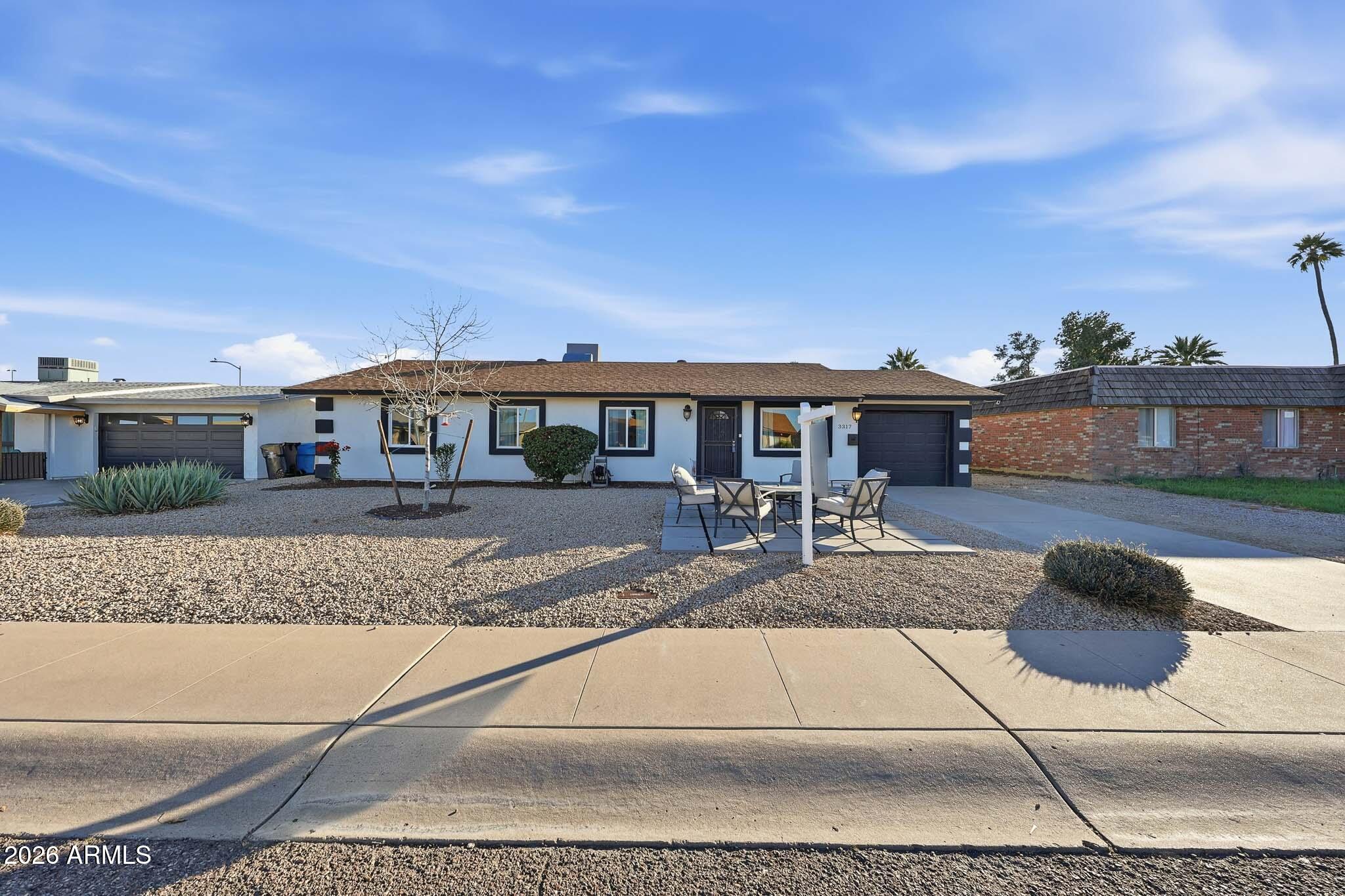 a view of a house with entertaining space