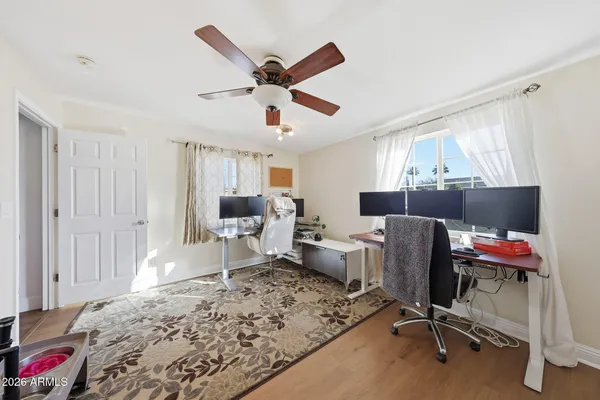 a workspace with furniture and window