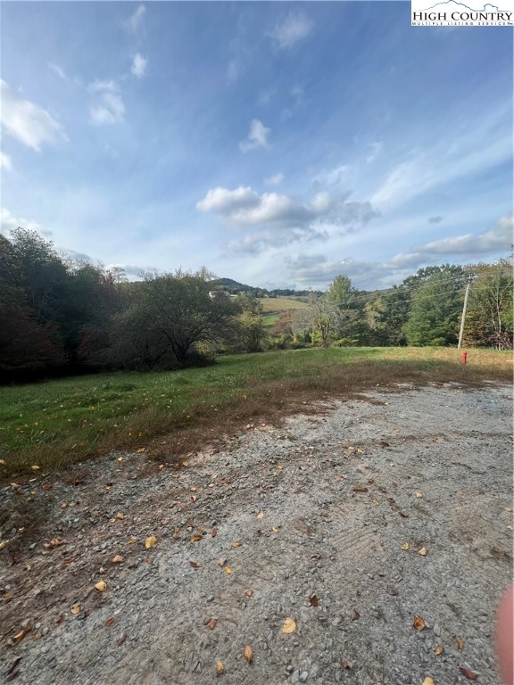 Busic Ridge, Unit 5 Sparta, NC 28675 - Photo 3 of 5 a view of outdoor space with mountain view