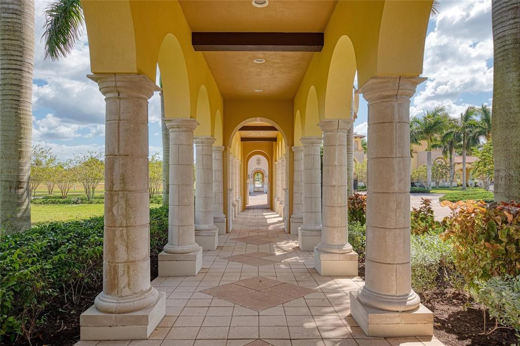 12440 Amica Loop Venice, FL 34293 - Photo 77 of 87 a front view of a house with a fountain