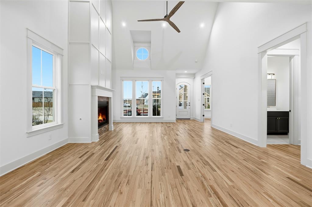 321 Garrett Way Midlothian, TX 76065 - Photo 13 of 28 a view of a livingroom with wooden floor