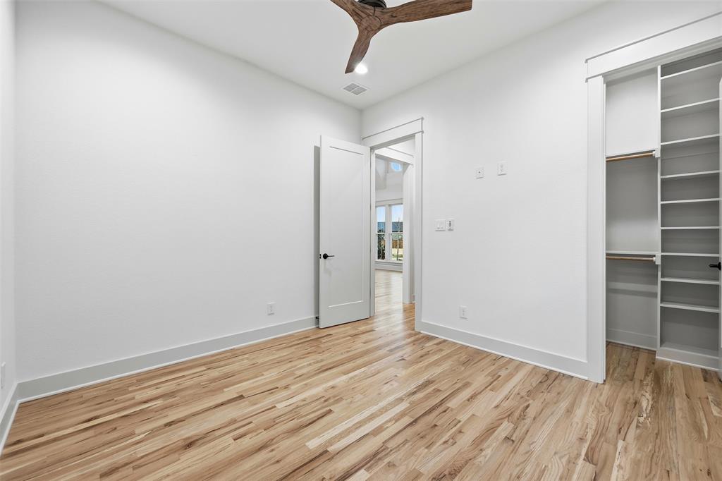 321 Garrett Way Midlothian, TX 76065 - Photo 24 of 28 wooden floor in an empty room