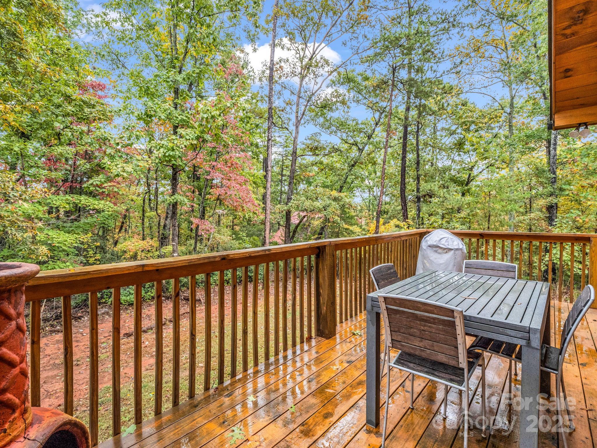 174 Doves Way Lake Lure, NC 28746 - Photo 31 of 42 a view of a two chairs and table in the balcony