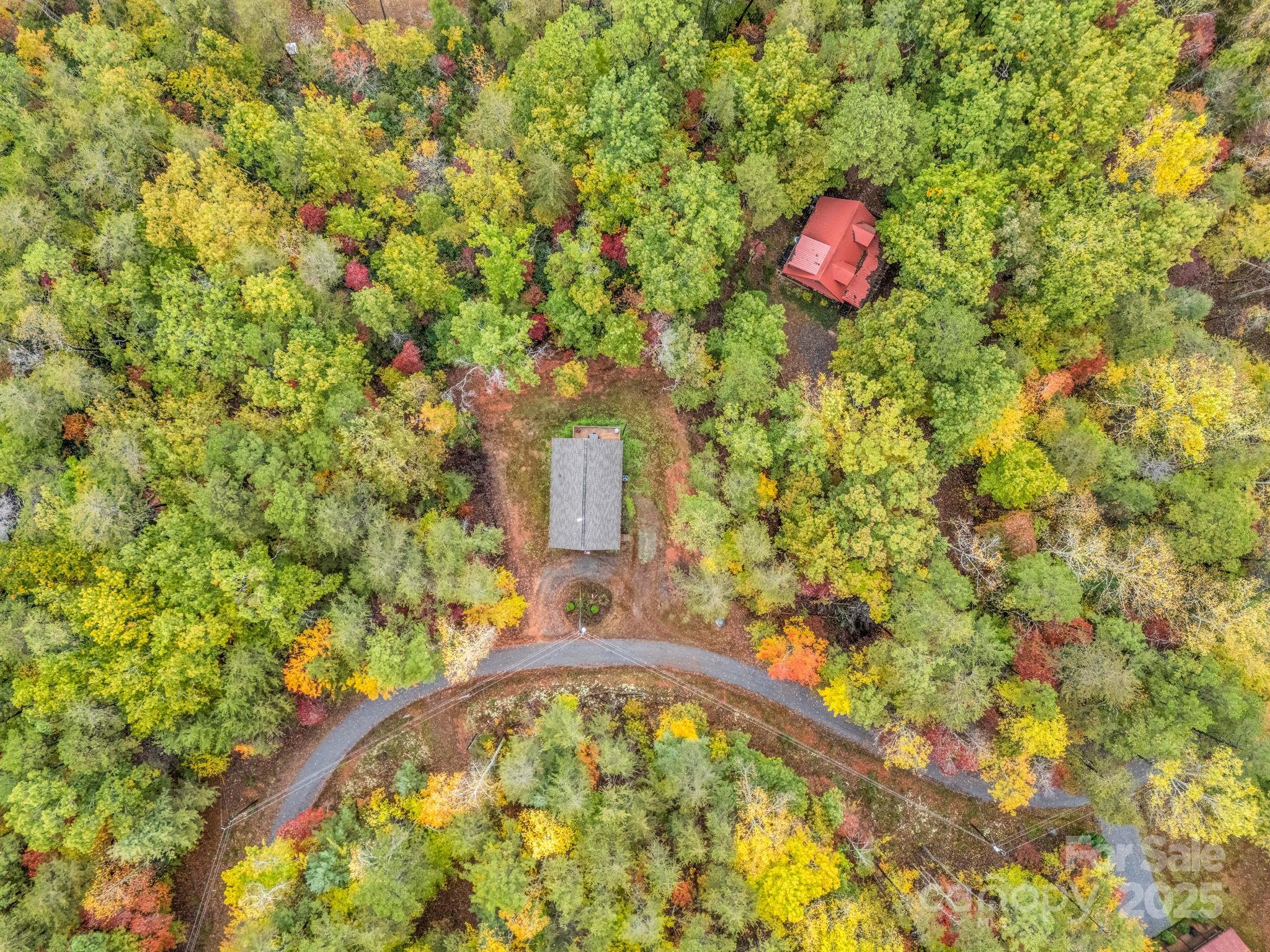 174 Doves Way Lake Lure, NC 28746 - Photo 36 of 42 a aerial view of a house with a yard