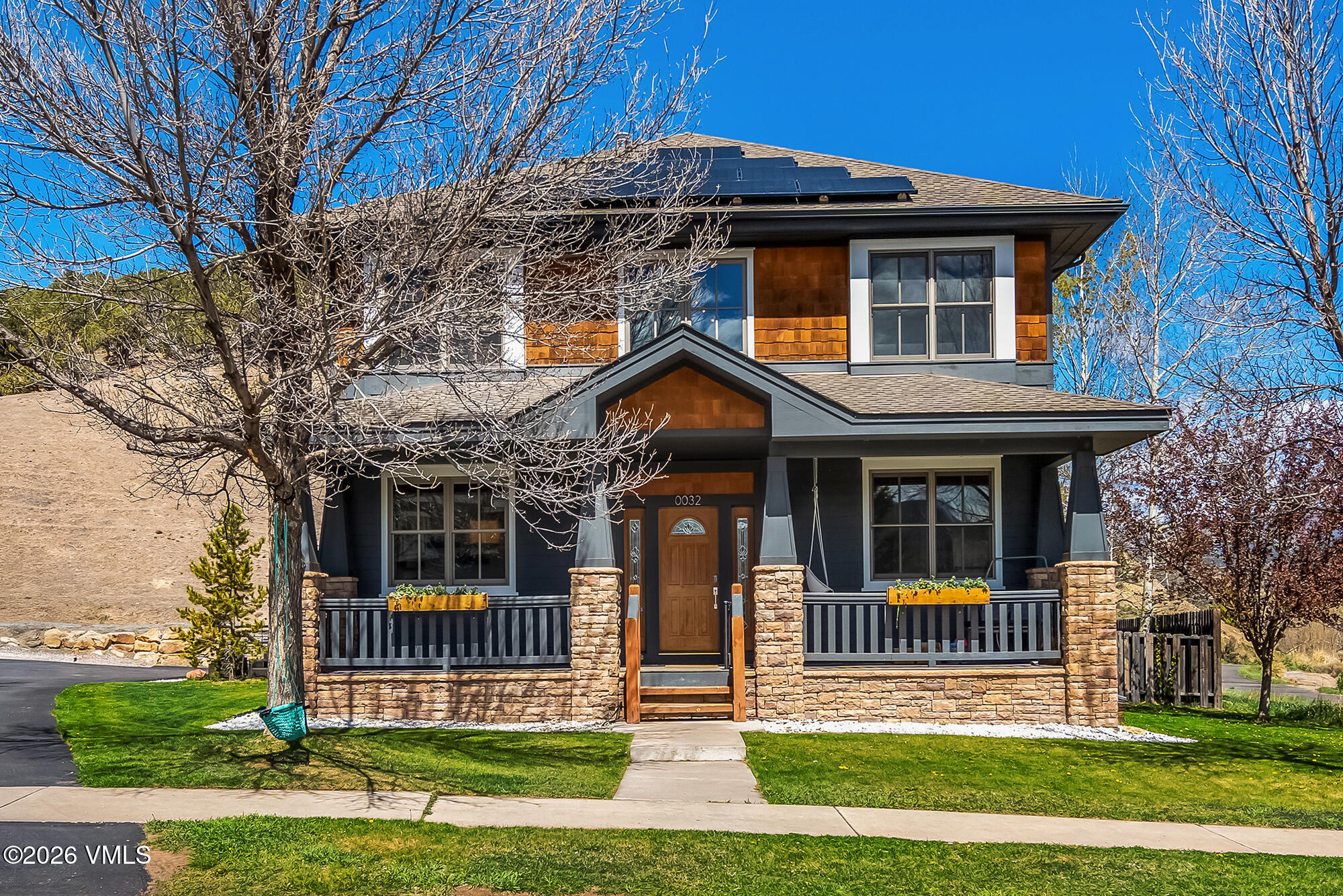 32 Newquist Street Eagle, CO 81631 - Photo 1 of 57 a front view of a house with a yard