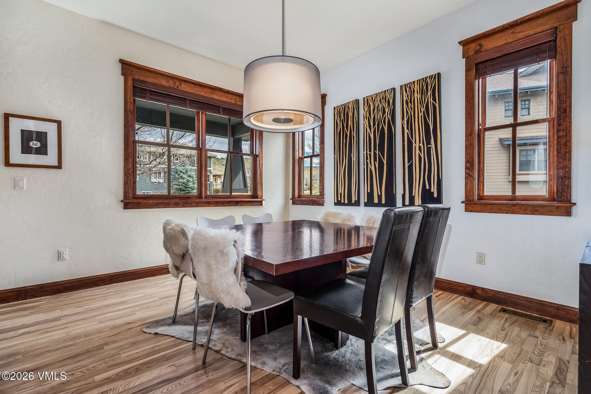 32 Newquist Street Eagle, CO 81631 - Photo 14 of 57 a view of a a dining room with furniture window and wooden floor