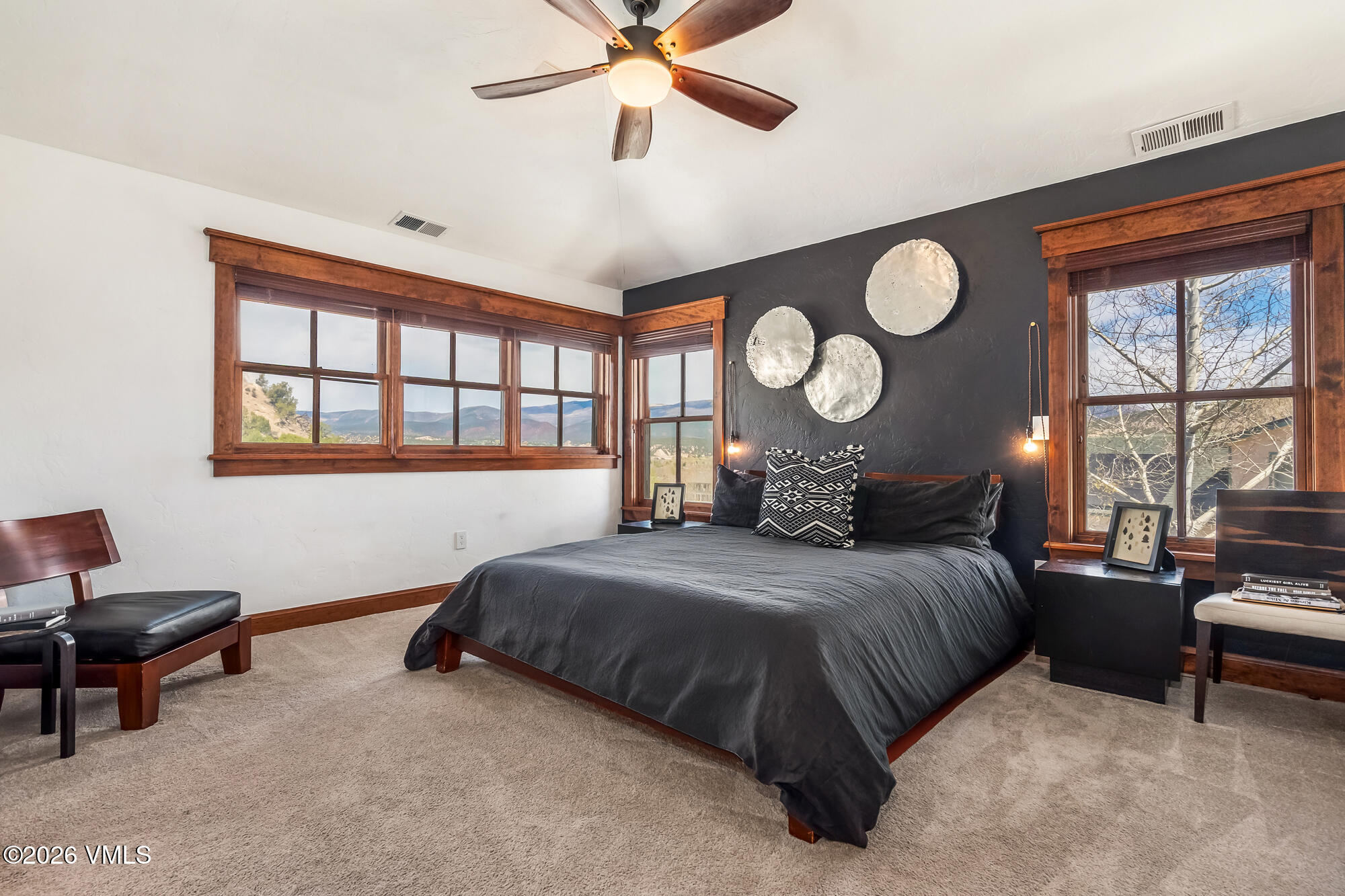 32 Newquist Street Eagle, CO 81631 - Photo 19 of 57 a bedroom with a bed and wooden floor