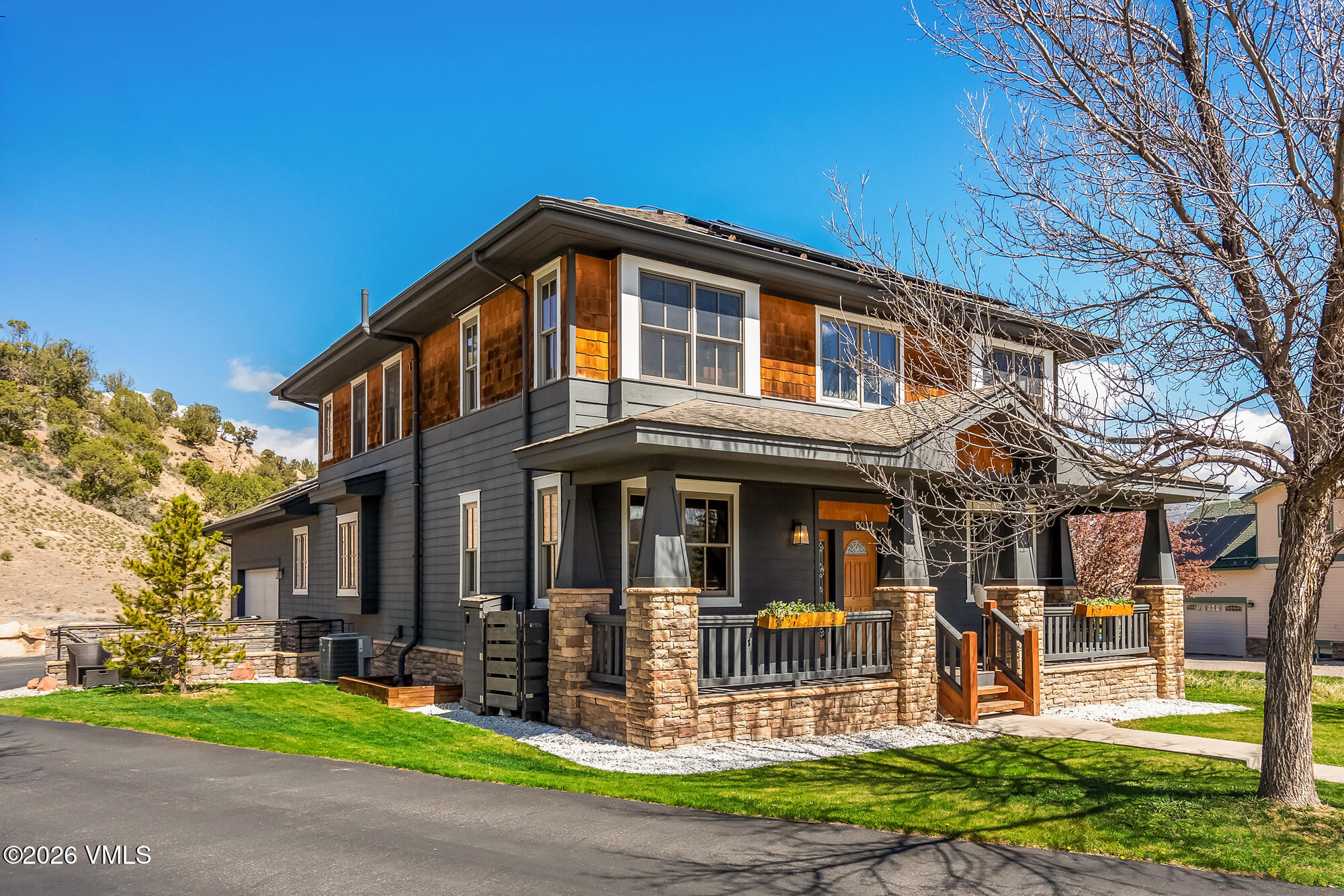 32 Newquist Street Eagle, CO 81631 - Photo 2 of 57 a front view of a house with garden