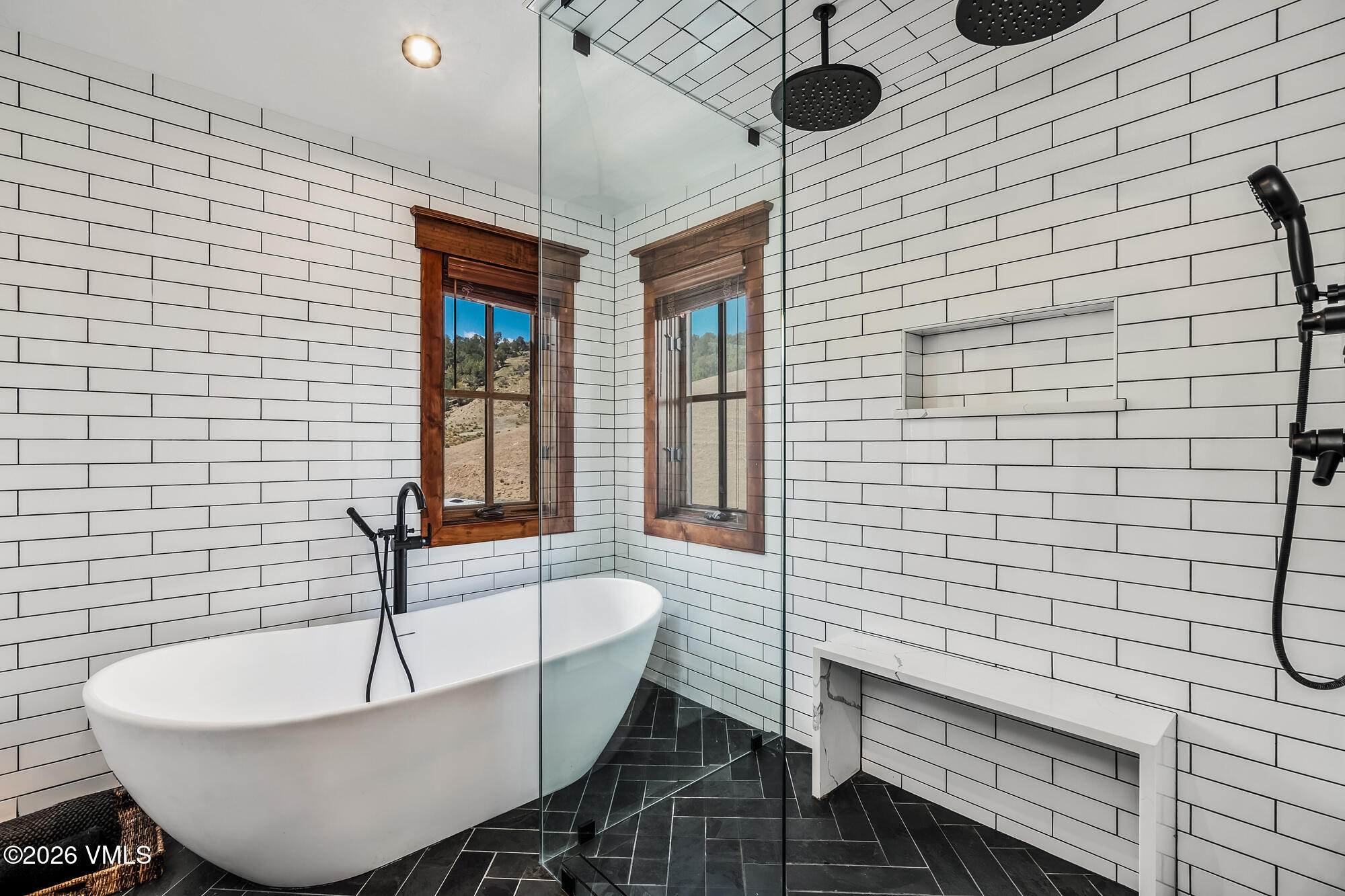 32 Newquist Street Eagle, CO 81631 - Photo 21 of 57 a bathroom with a bathtub and shower