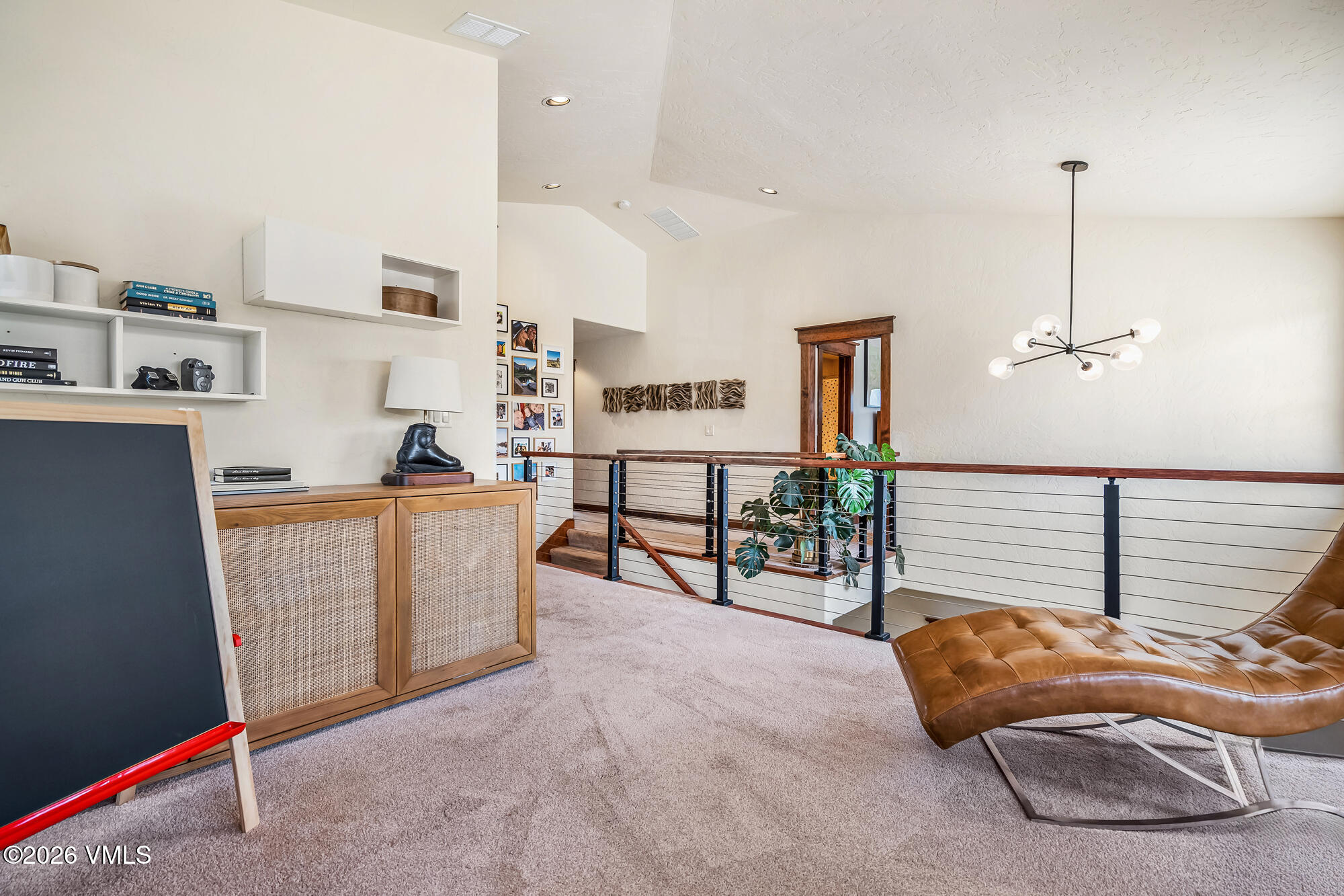 32 Newquist Street Eagle, CO 81631 - Photo 23 of 57 a living room with furniture and a table