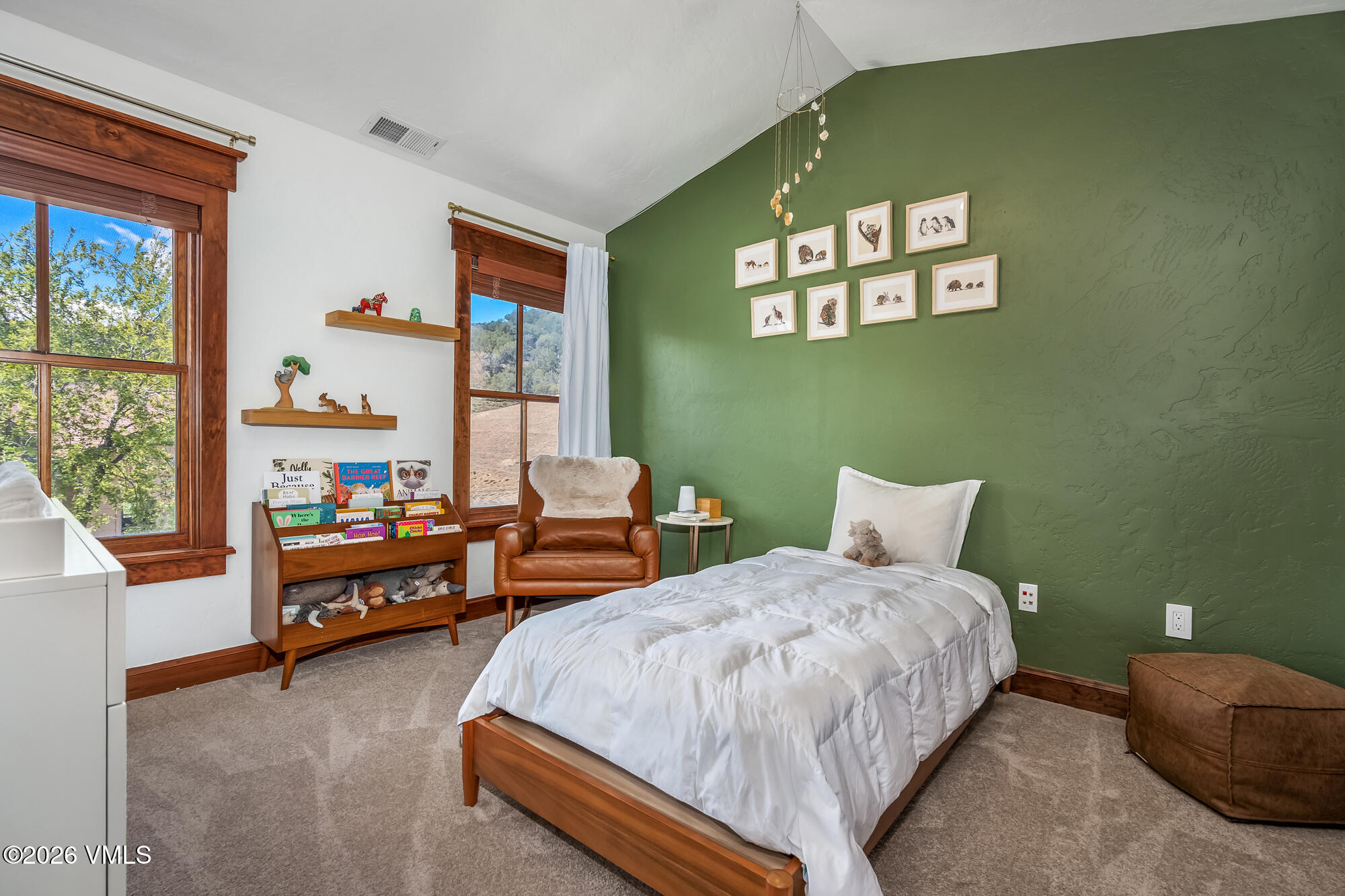 32 Newquist Street Eagle, CO 81631 - Photo 27 of 57 a bedroom with a bed and a window