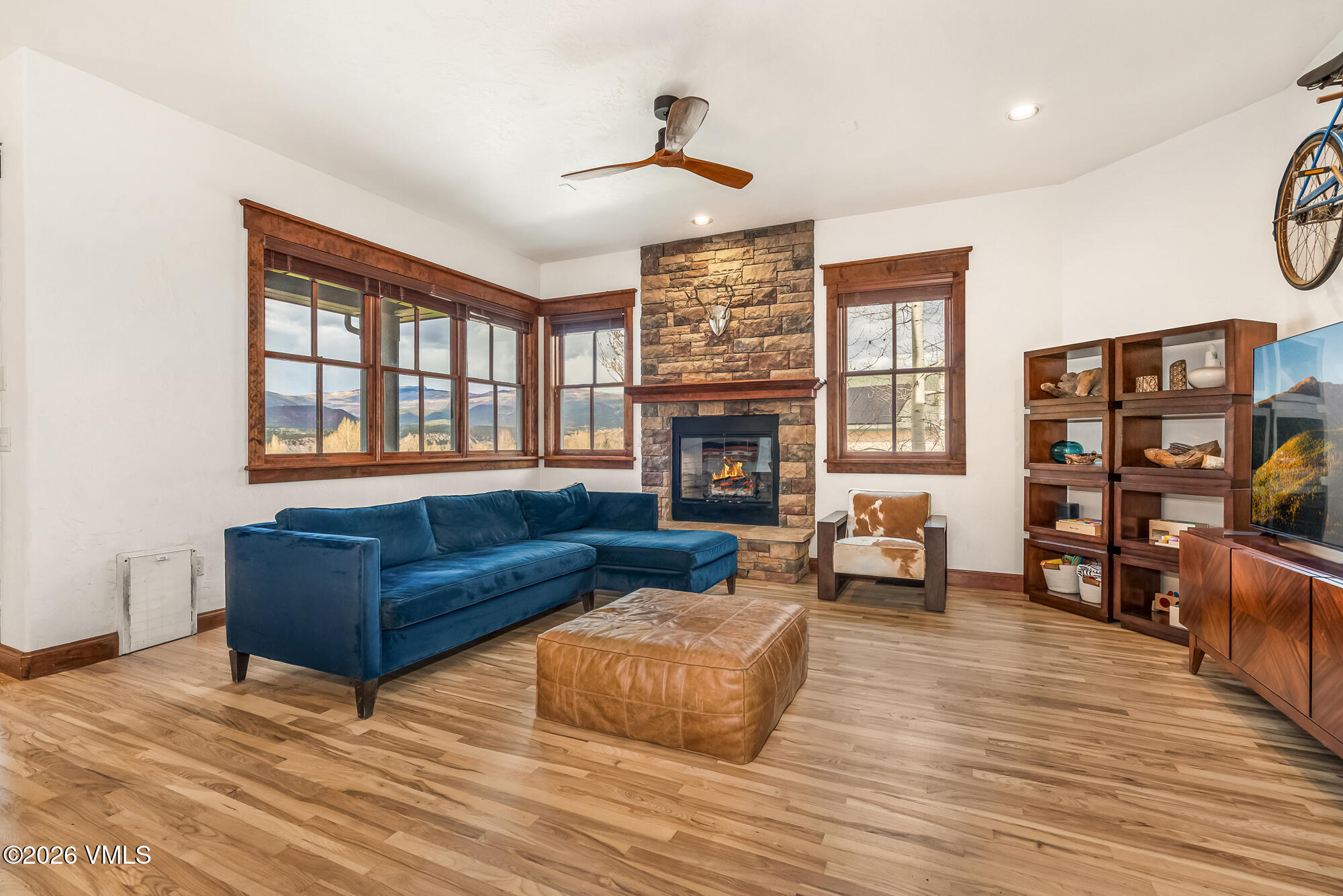 32 Newquist Street Eagle, CO 81631 - Photo 5 of 57 a living room with furniture and a fireplace