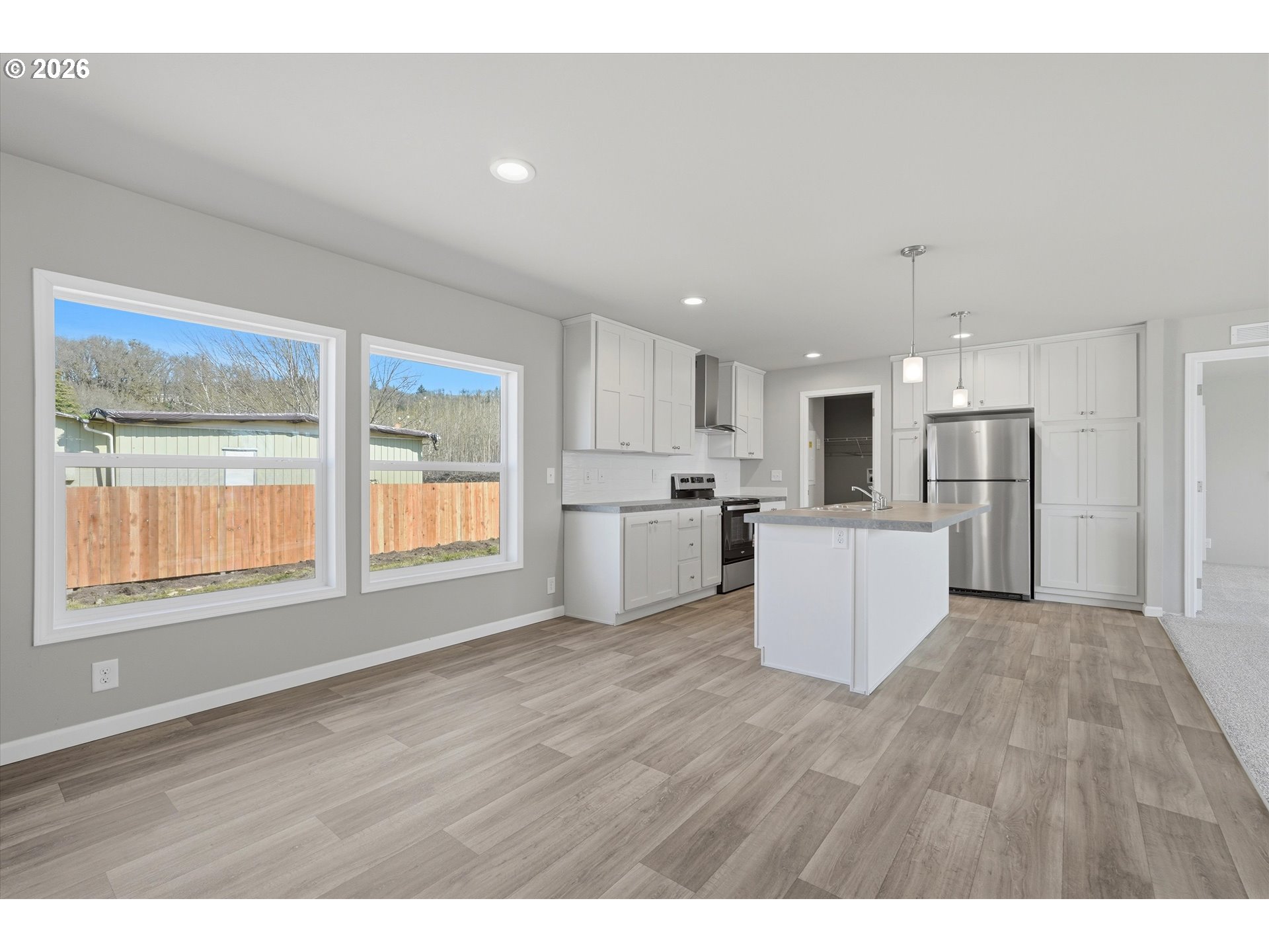 412 Rosedell Street Amity, OR 97101 - Photo 11 of 38 a view of kitchen with wooden floor