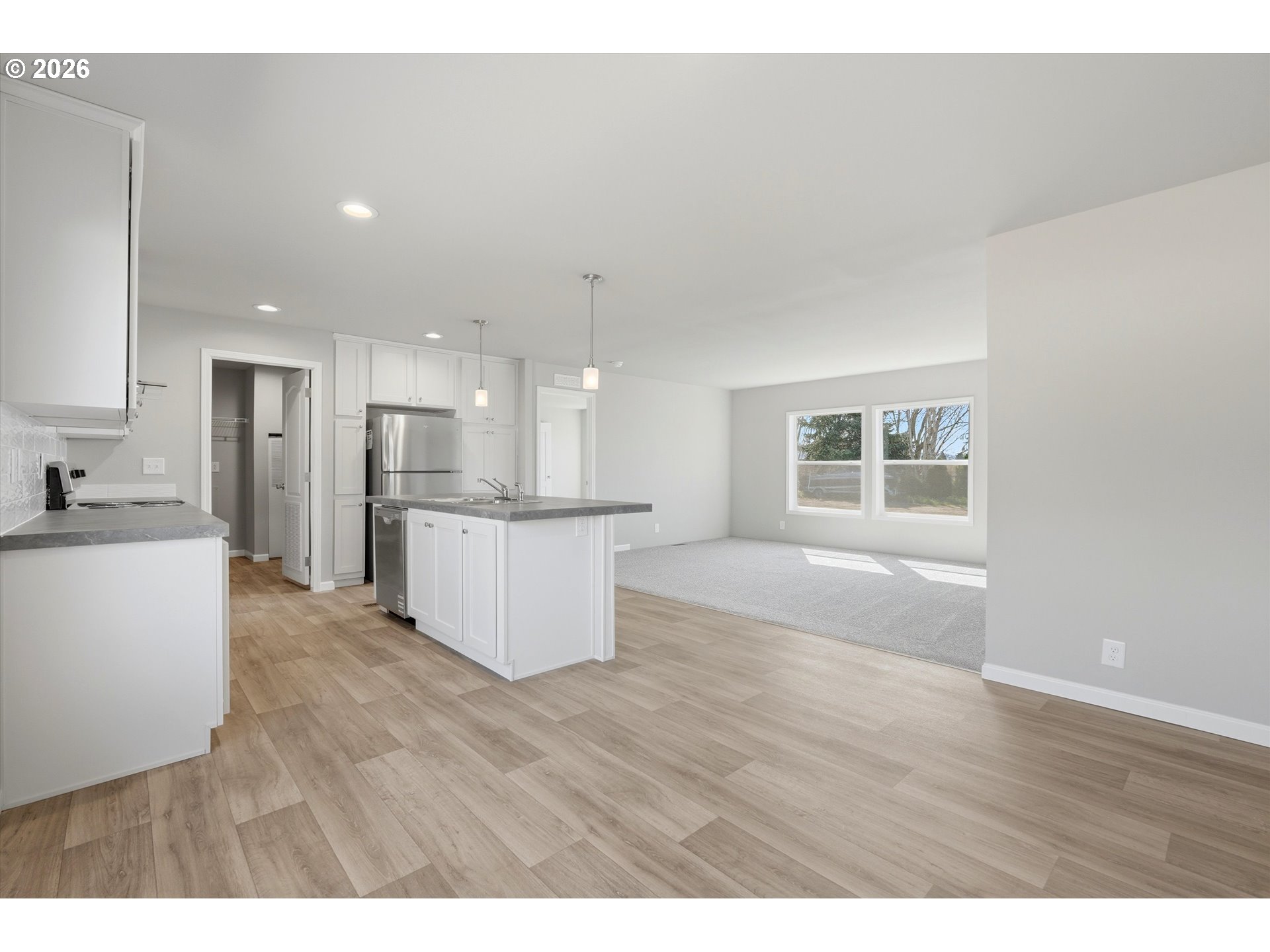 412 Rosedell Street Amity, OR 97101 - Photo 12 of 38 a view of kitchen with wooden floor