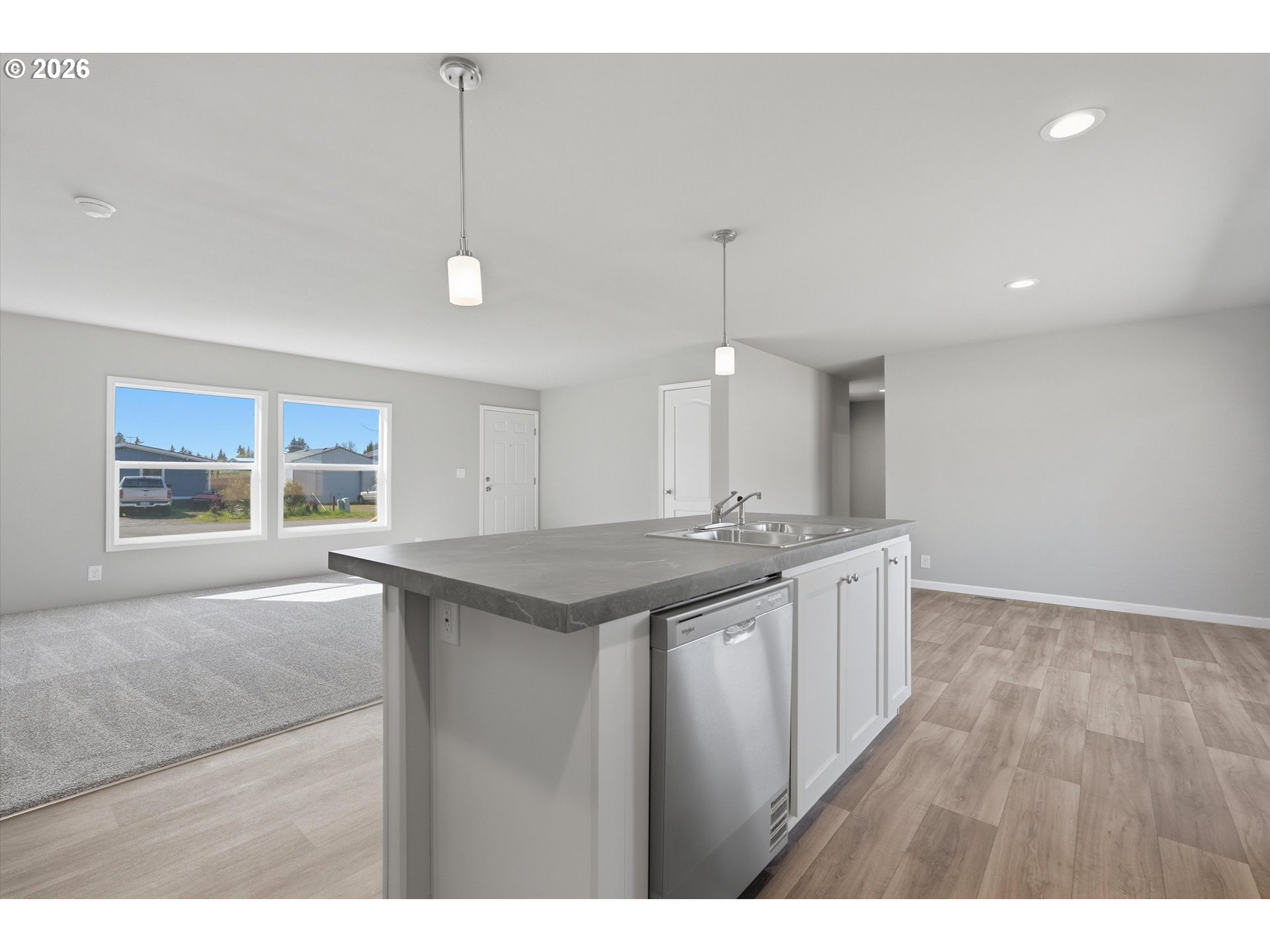 412 Rosedell Street Amity, OR 97101 - Photo 15 of 38 a kitchen with a stove a sink a refrigerator and window