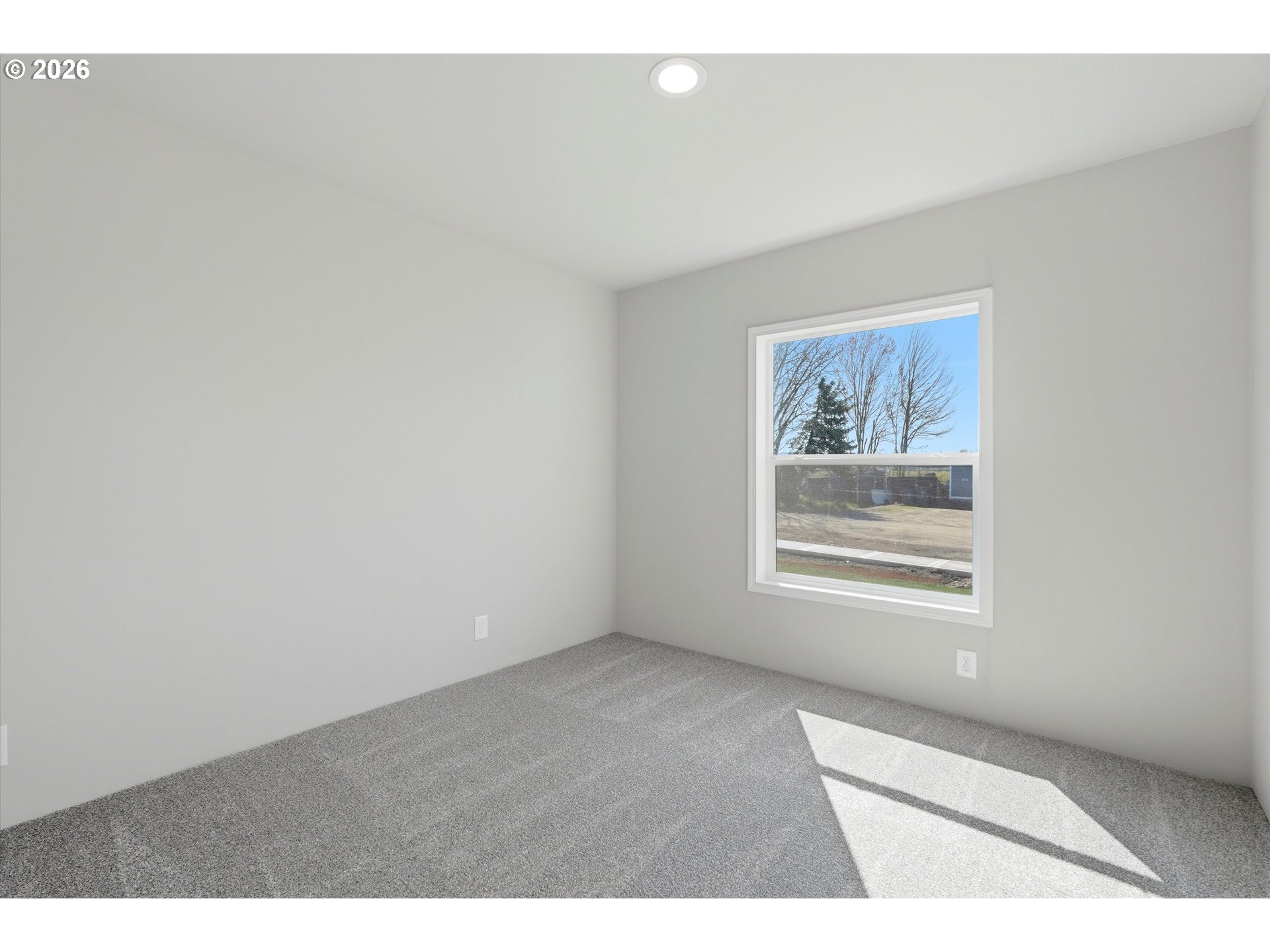 412 Rosedell Street Amity, OR 97101 - Photo 23 of 38 a view of an empty room with a window