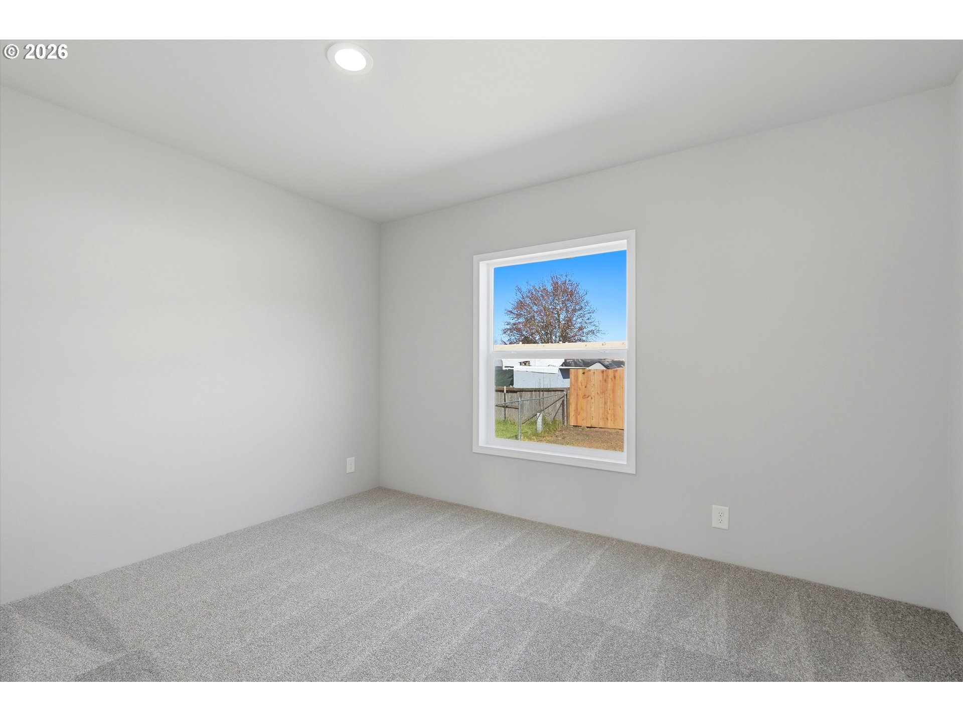 412 Rosedell Street Amity, OR 97101 - Photo 25 of 38 a view of an empty room and a window