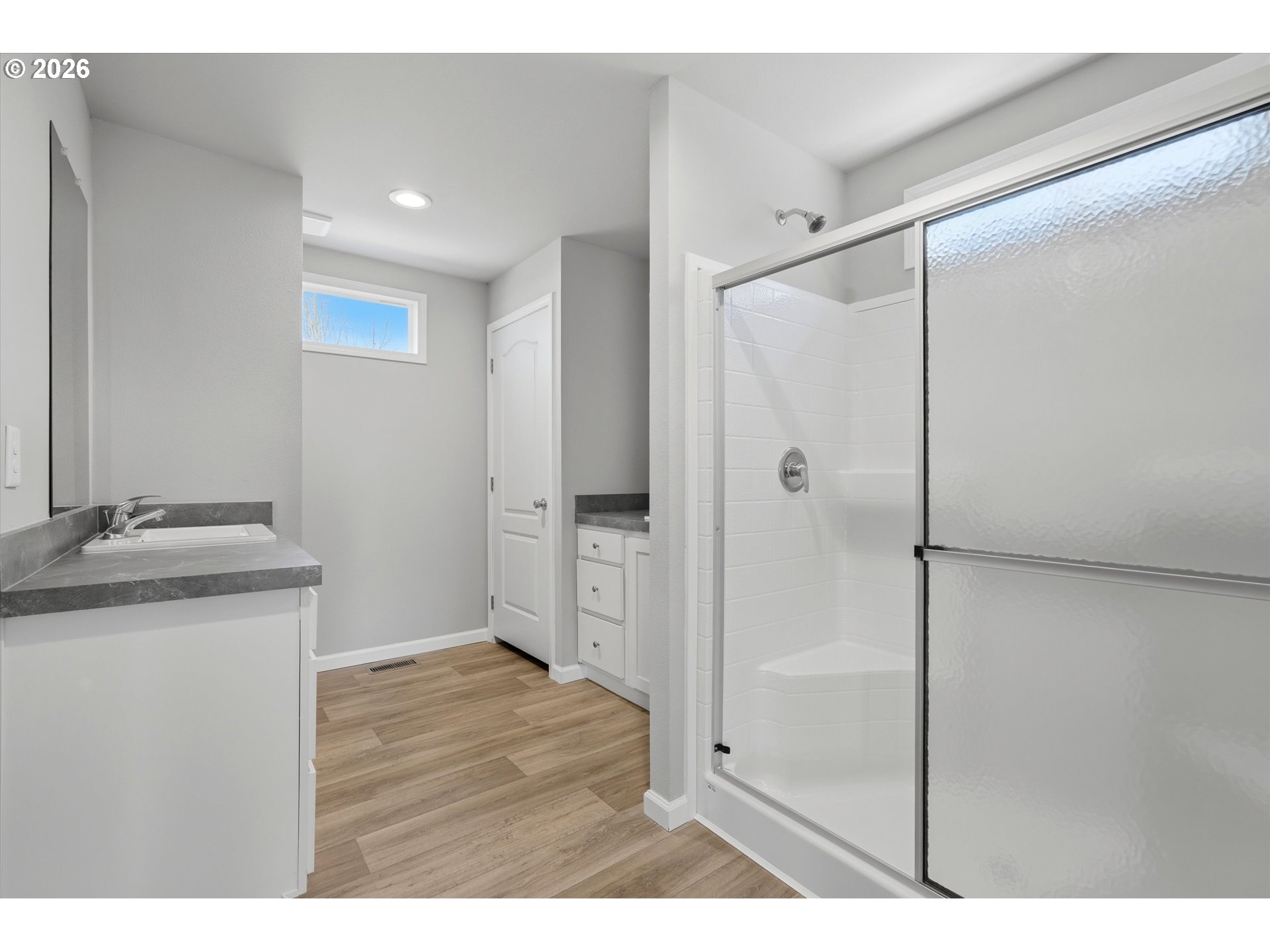 412 Rosedell Street Amity, OR 97101 - Photo 31 of 38 a bathroom with a granite countertop sink mirror and shower