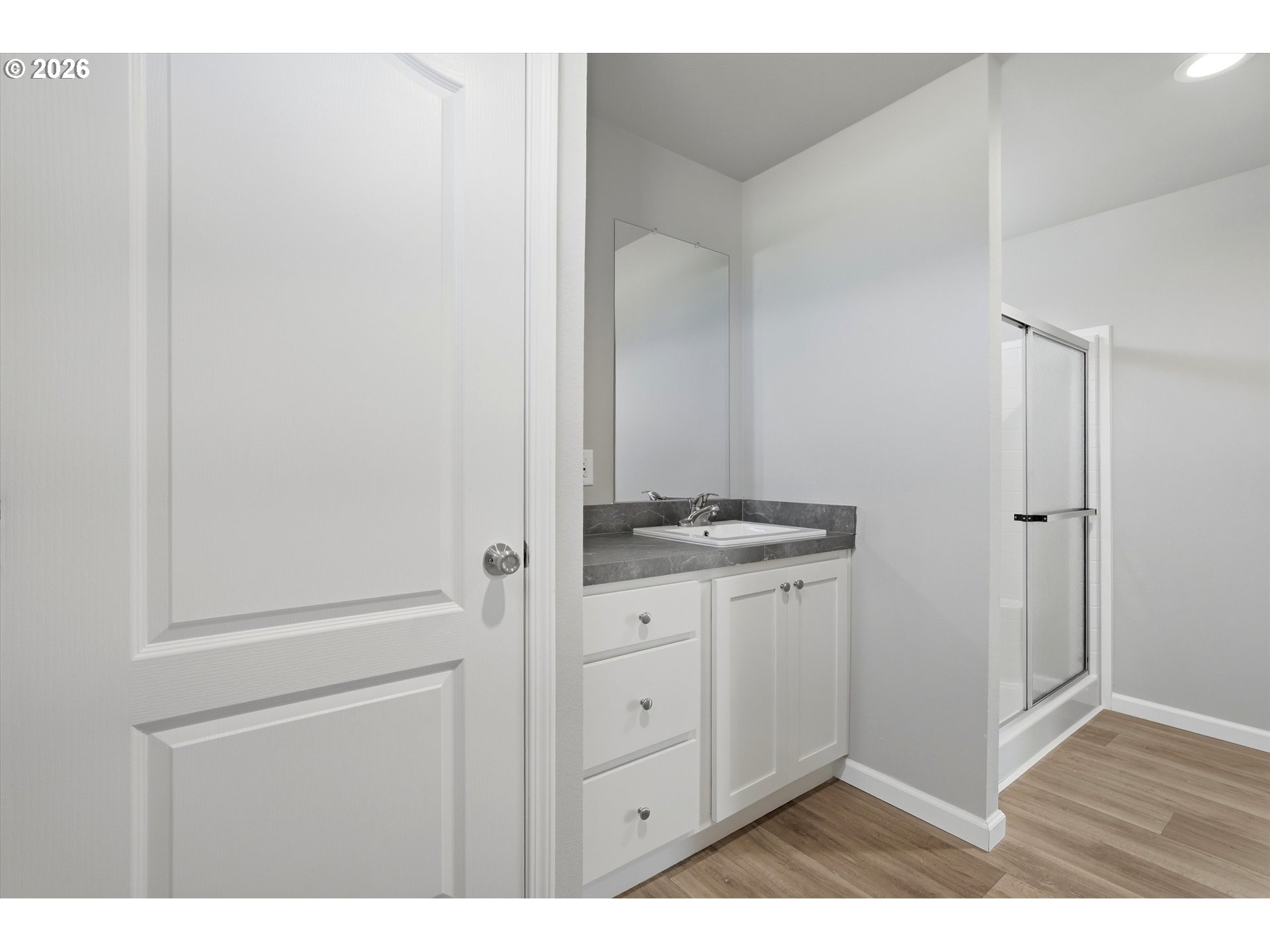 412 Rosedell Street Amity, OR 97101 - Photo 33 of 38 a bathroom with a granite countertop sink and a mirror