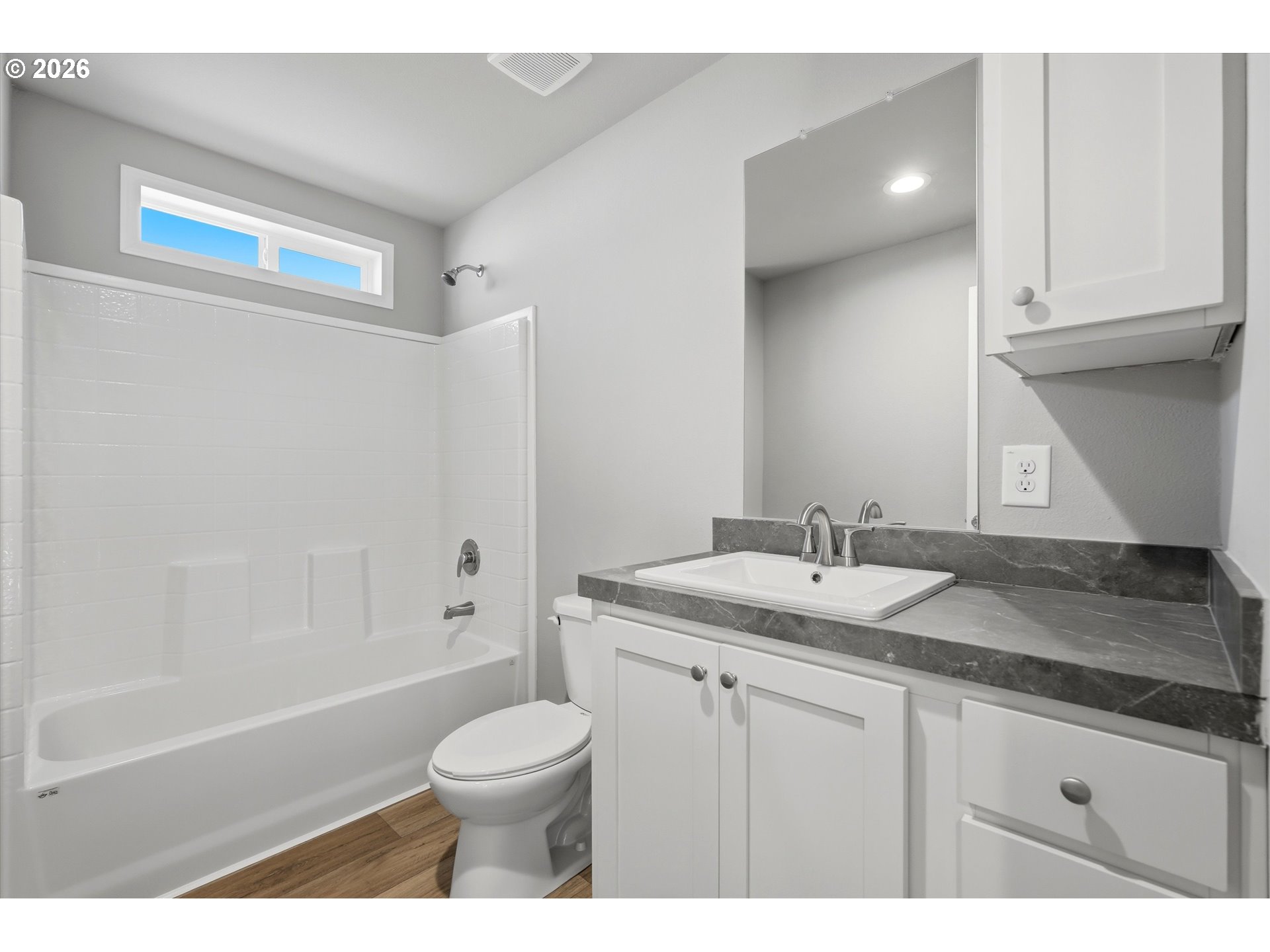 412 Rosedell Street Amity, OR 97101 - Photo 34 of 38 a bathroom with a granite countertop sink toilet a large mirror a bathtub and shower