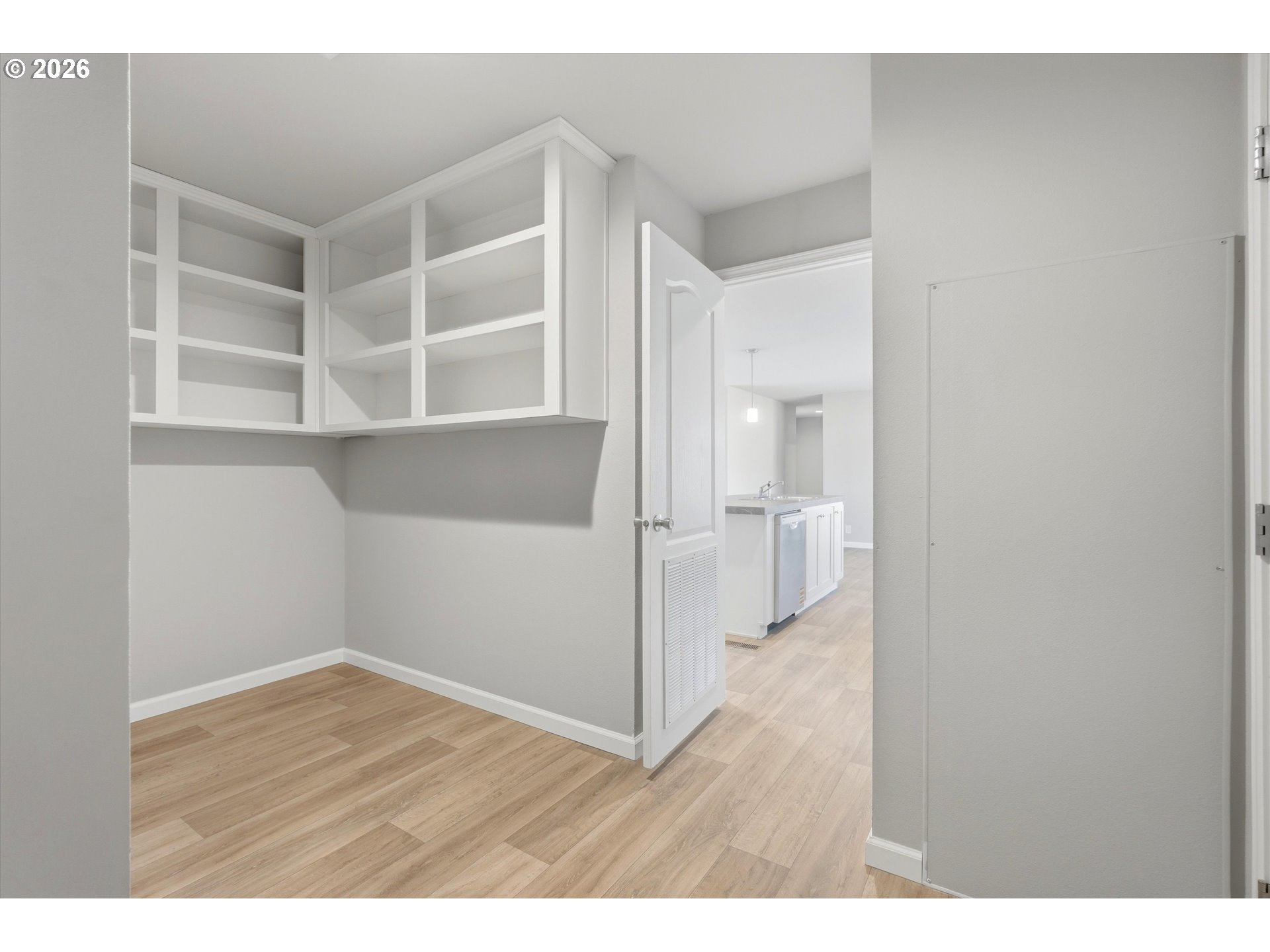 412 Rosedell Street Amity, OR 97101 - Photo 36 of 38 a view of an empty room with wooden floor and a window