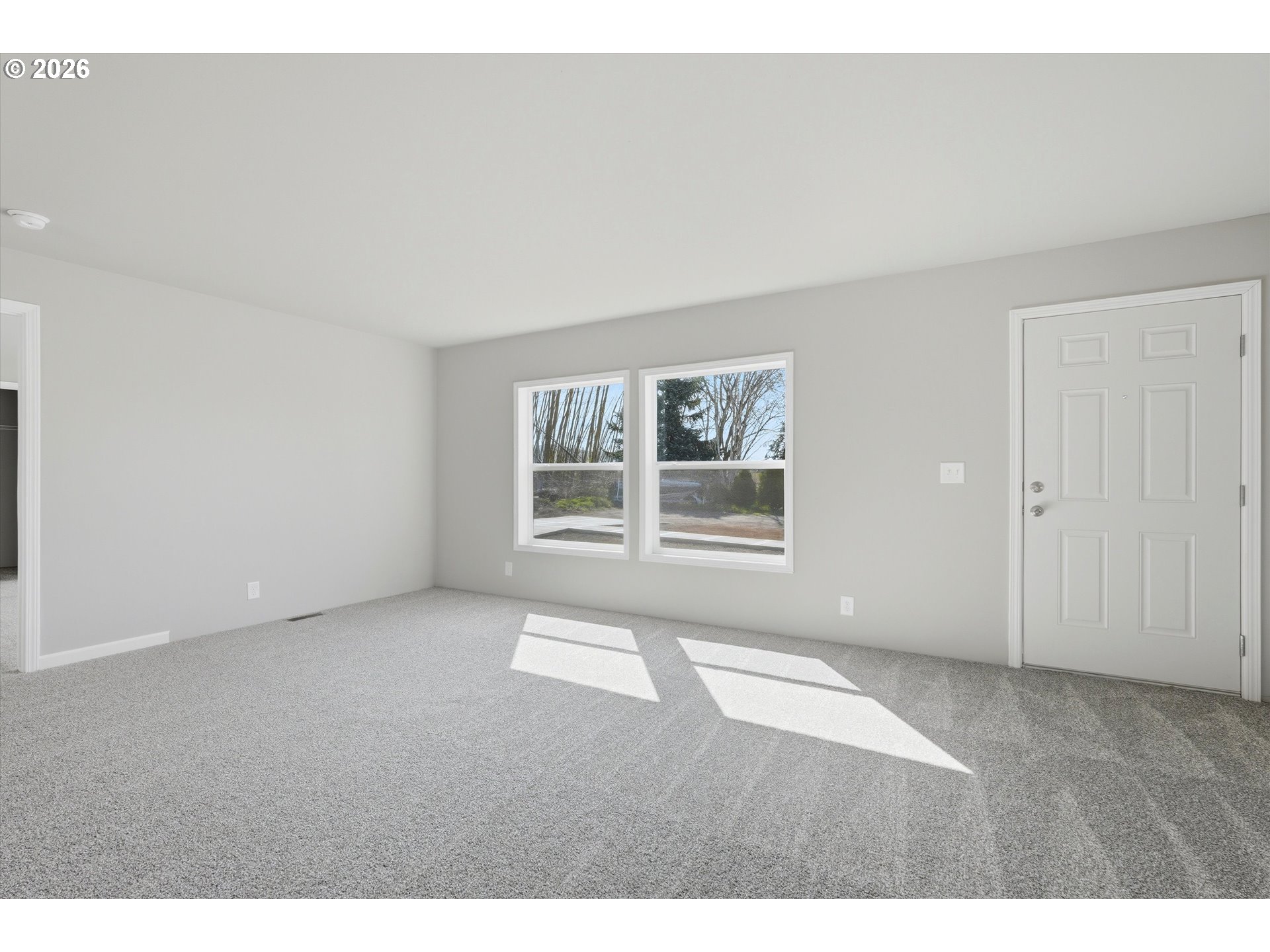 412 Rosedell Street Amity, OR 97101 - Photo 7 of 38 a view of an empty room with a window