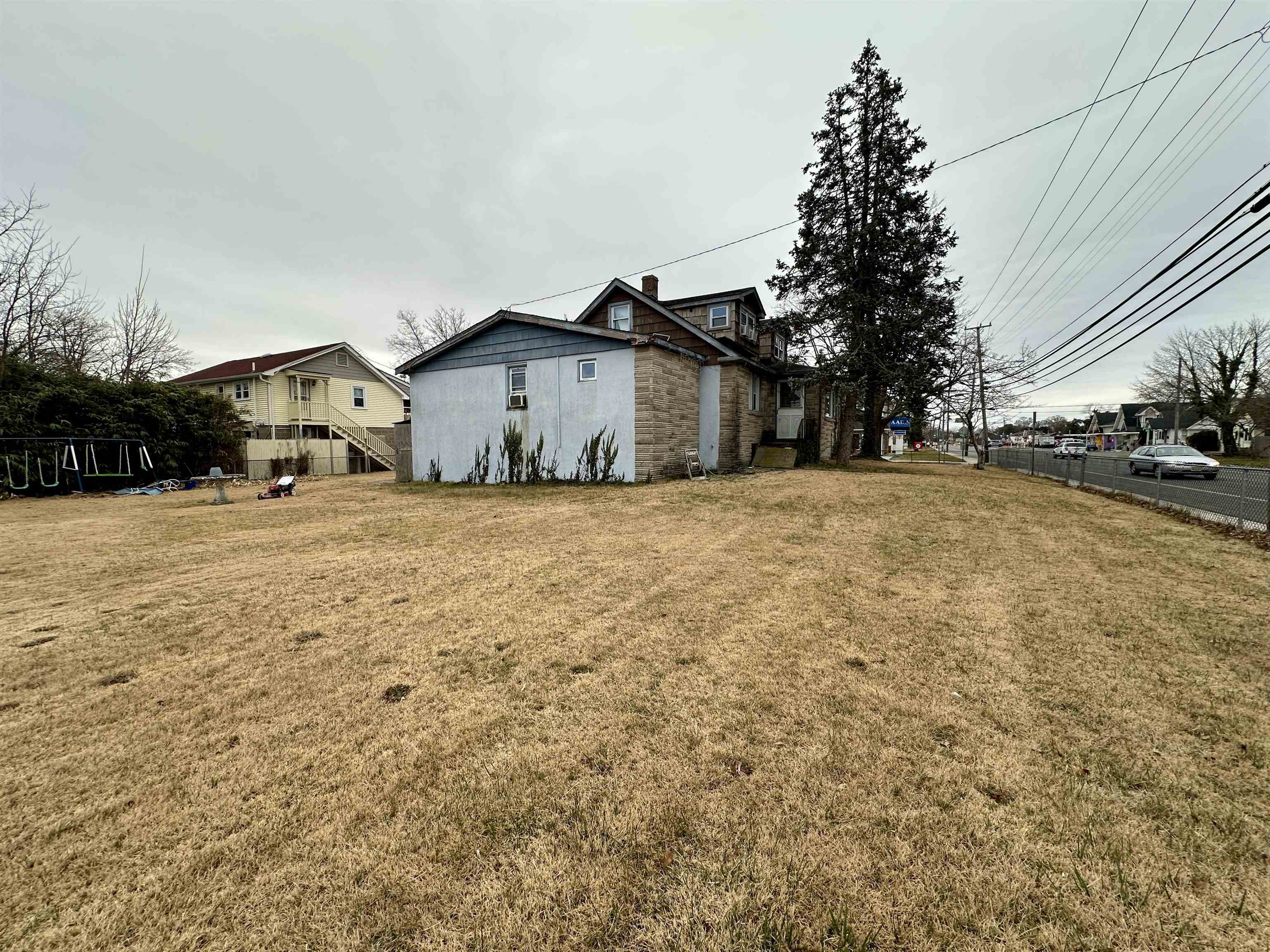 1634 Bayshore Road Villas, NJ 08251 - Photo 13 of 13 a view of a house with a yard covered in snow