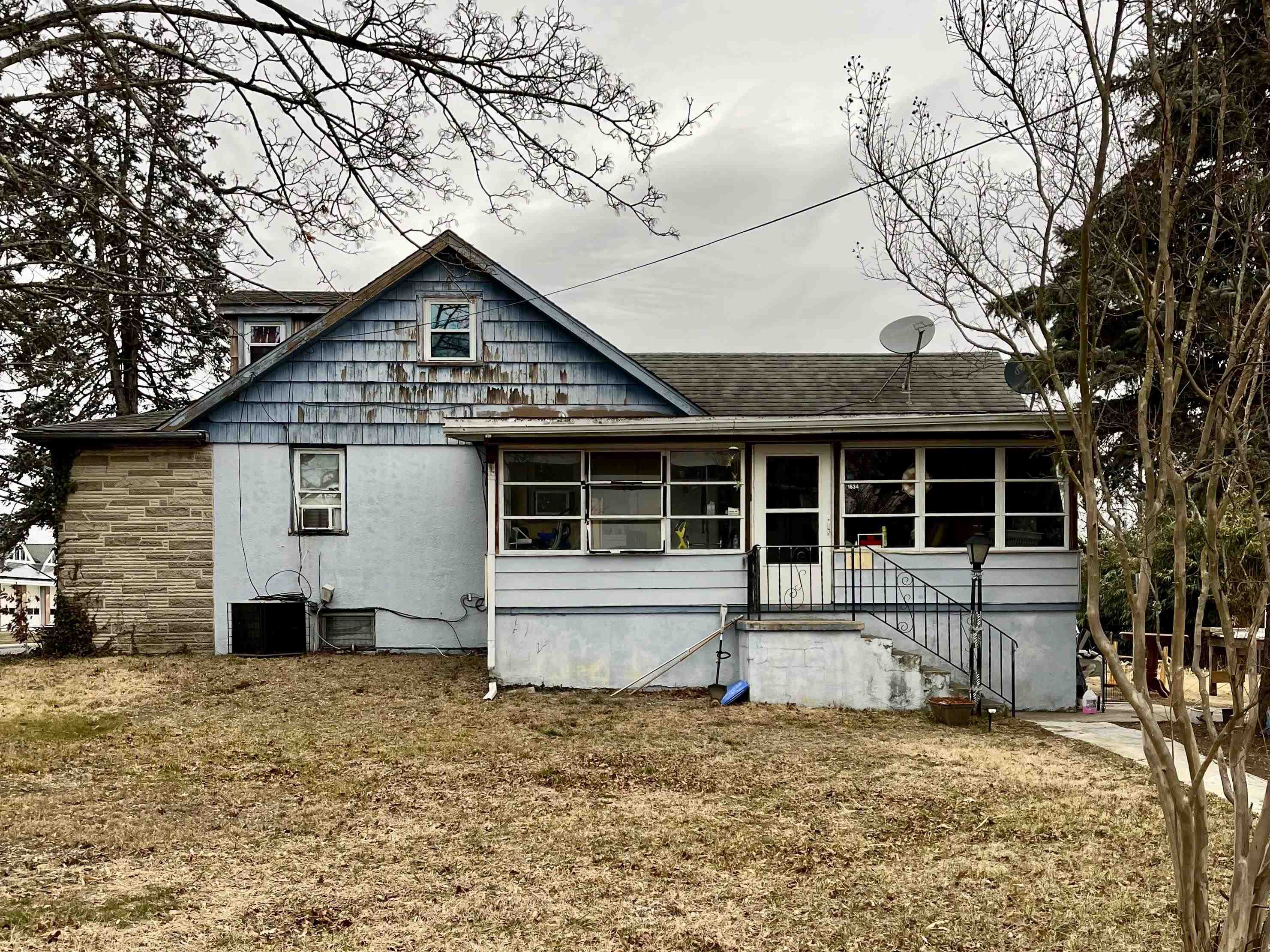 1634 Bayshore Road Villas, NJ 08251 - Photo 5 of 13 a house with trees in the background
