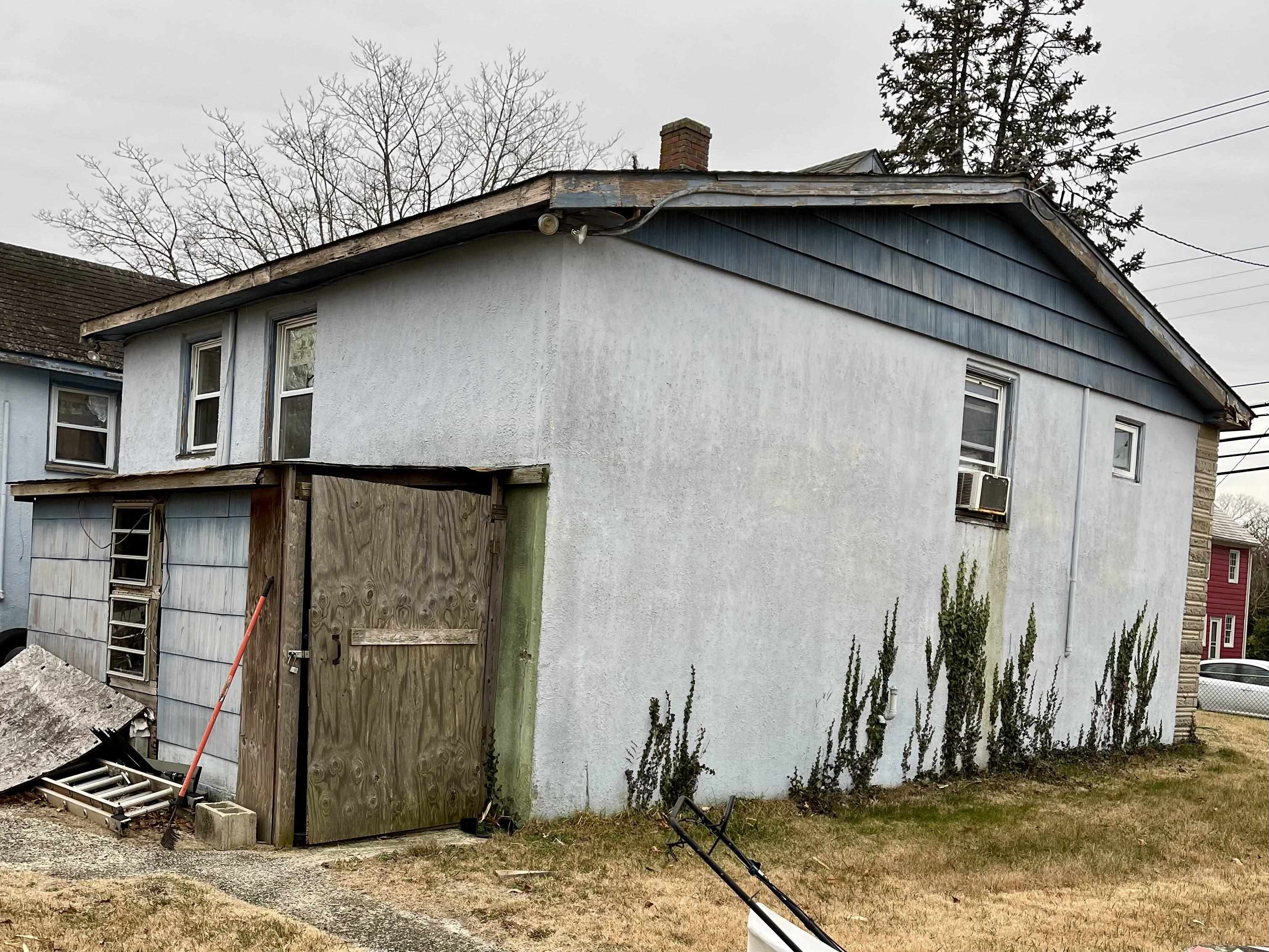1634 Bayshore Road Villas, NJ 08251 - Photo 10 of 13 a house with trees in the background