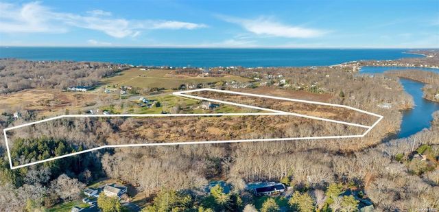 a view of a city with ocean view