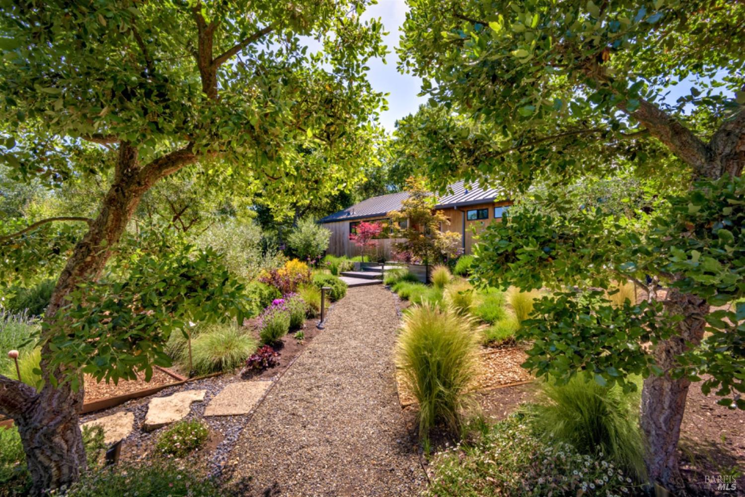 a view of a pathway with a yard