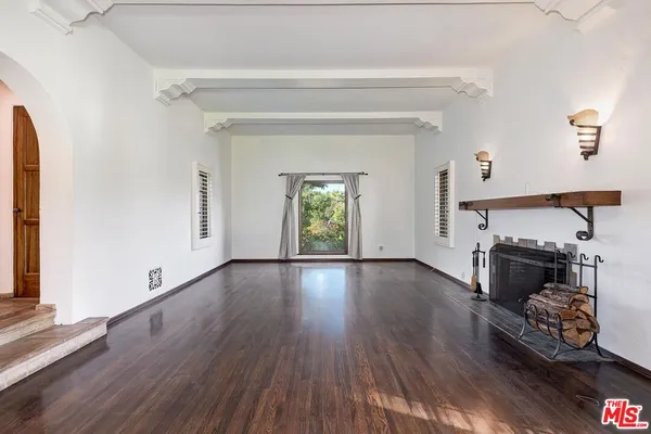a view of an empty room and window