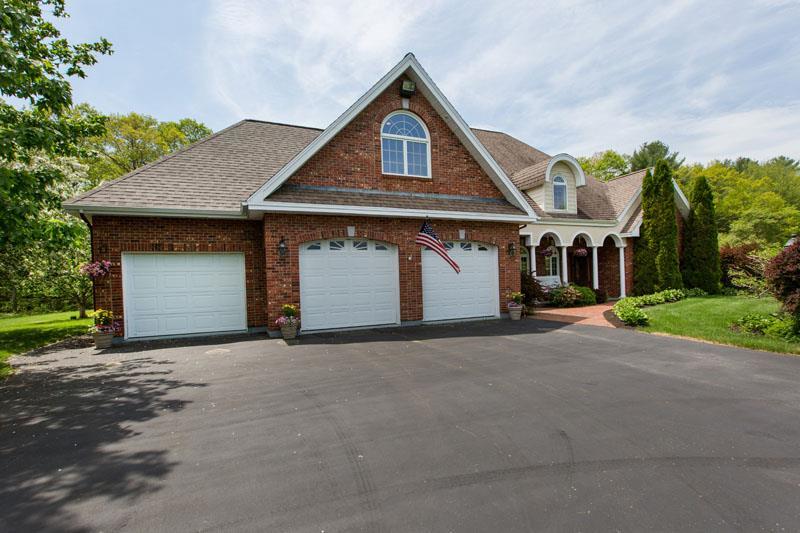 340 Woodside Road Brunswick, ME 04011 - Photo 2 of 35 3-car garage for your vehicles and toys
