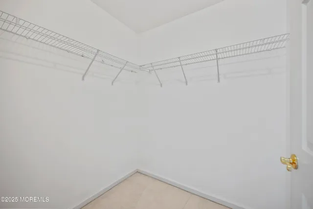 a bathroom with a bathtub and a toilet