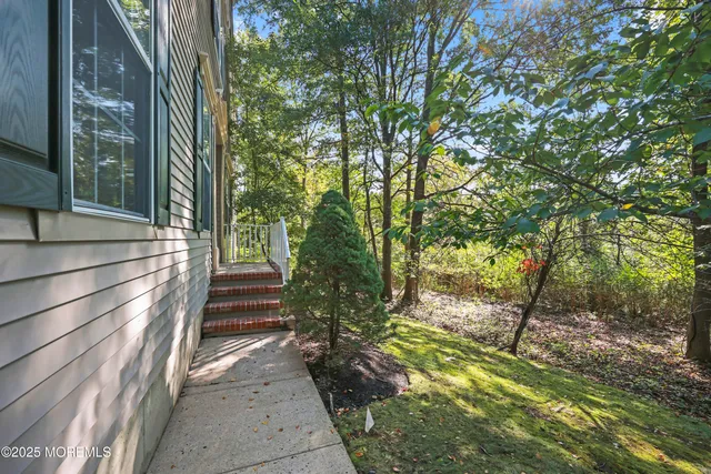 a view of a door and chair in the balcony