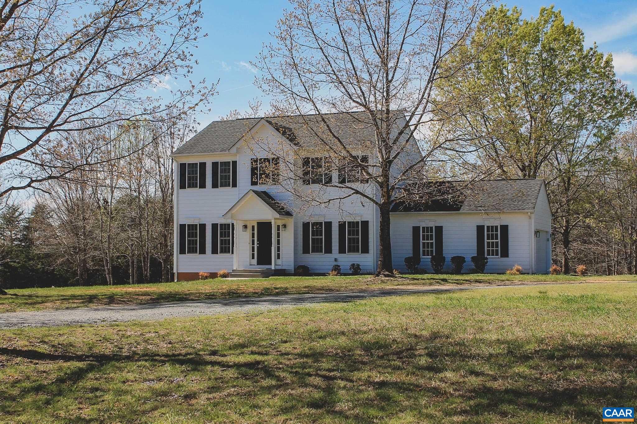 6518 Jefferson Mill Road Scottsville, VA 24590 - Photo 24 of 60 a front view of a house with a garden