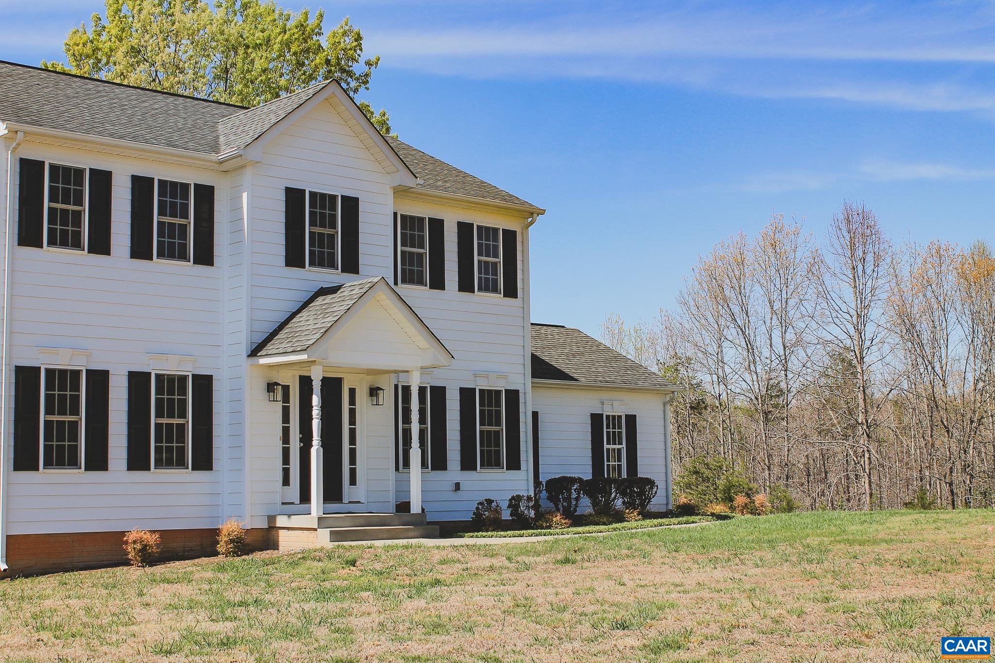 6518 Jefferson Mill Road Scottsville, VA 24590 - Photo 26 of 60 a front view of a house with a yard