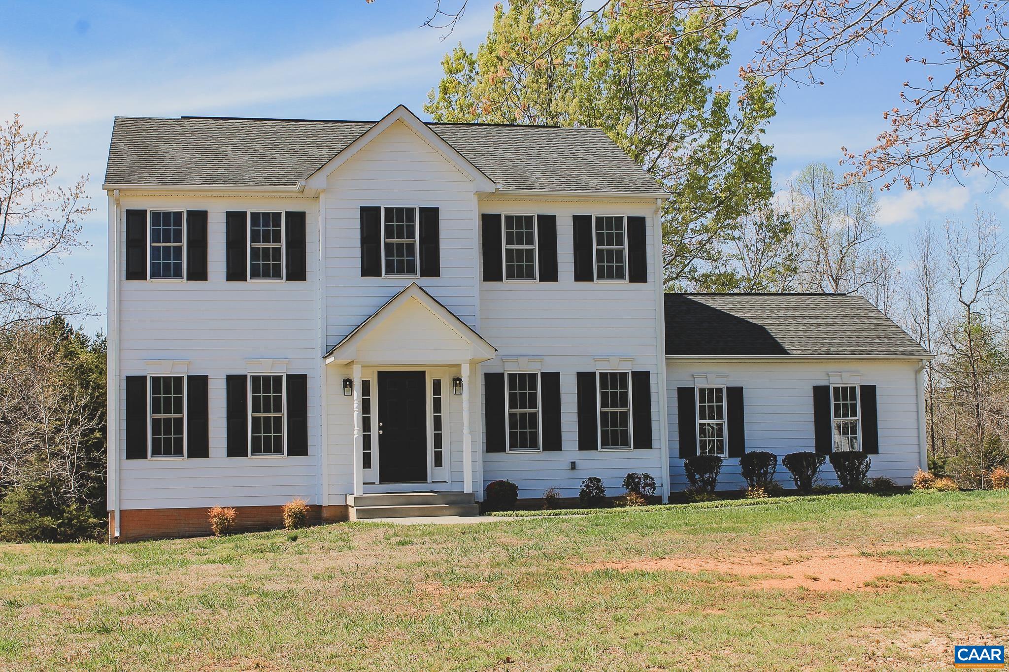 6518 Jefferson Mill Road Scottsville, VA 24590 - Photo 27 of 60 front view of a house and a yard