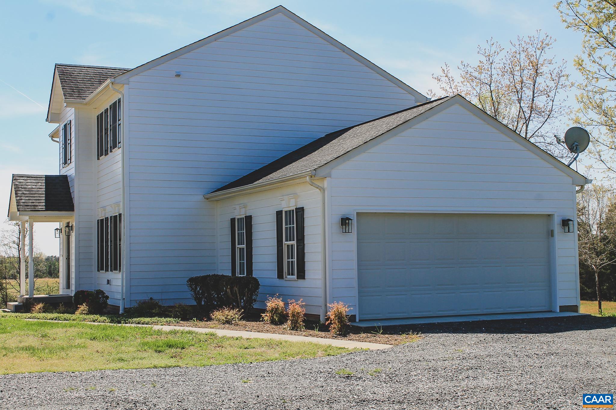 6518 Jefferson Mill Road Scottsville, VA 24590 - Photo 29 of 60 a view of a house with yard
