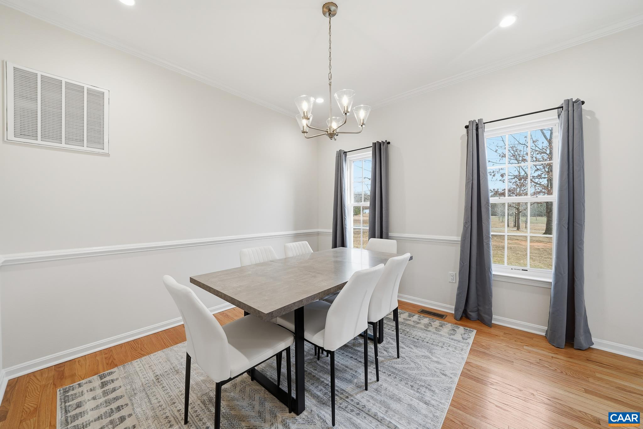 6518 Jefferson Mill Road Scottsville, VA 24590 - Photo 36 of 60 a view of a dining room with furniture window and wooden floor