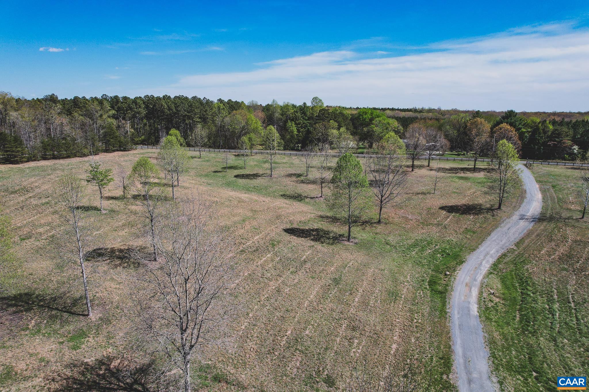 6518 Jefferson Mill Road Scottsville, VA 24590 - Photo 56 of 60 a view of a field with wooden fence