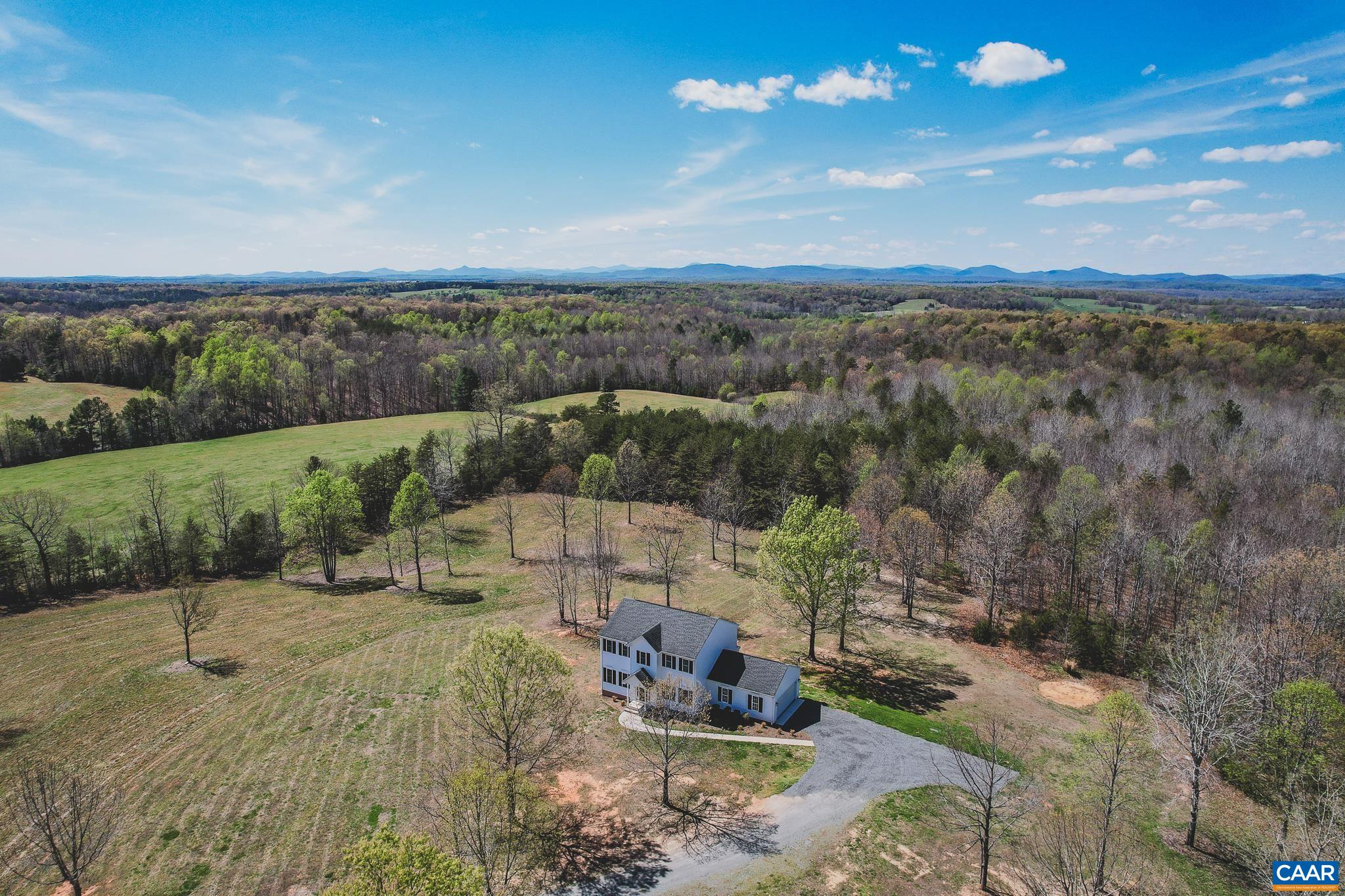 6518 Jefferson Mill Road Scottsville, VA 24590 - Photo 7 of 60 an aerial view of a house with a yard