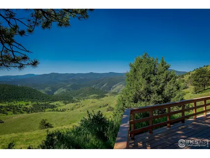 a view of a city with mountains in the background