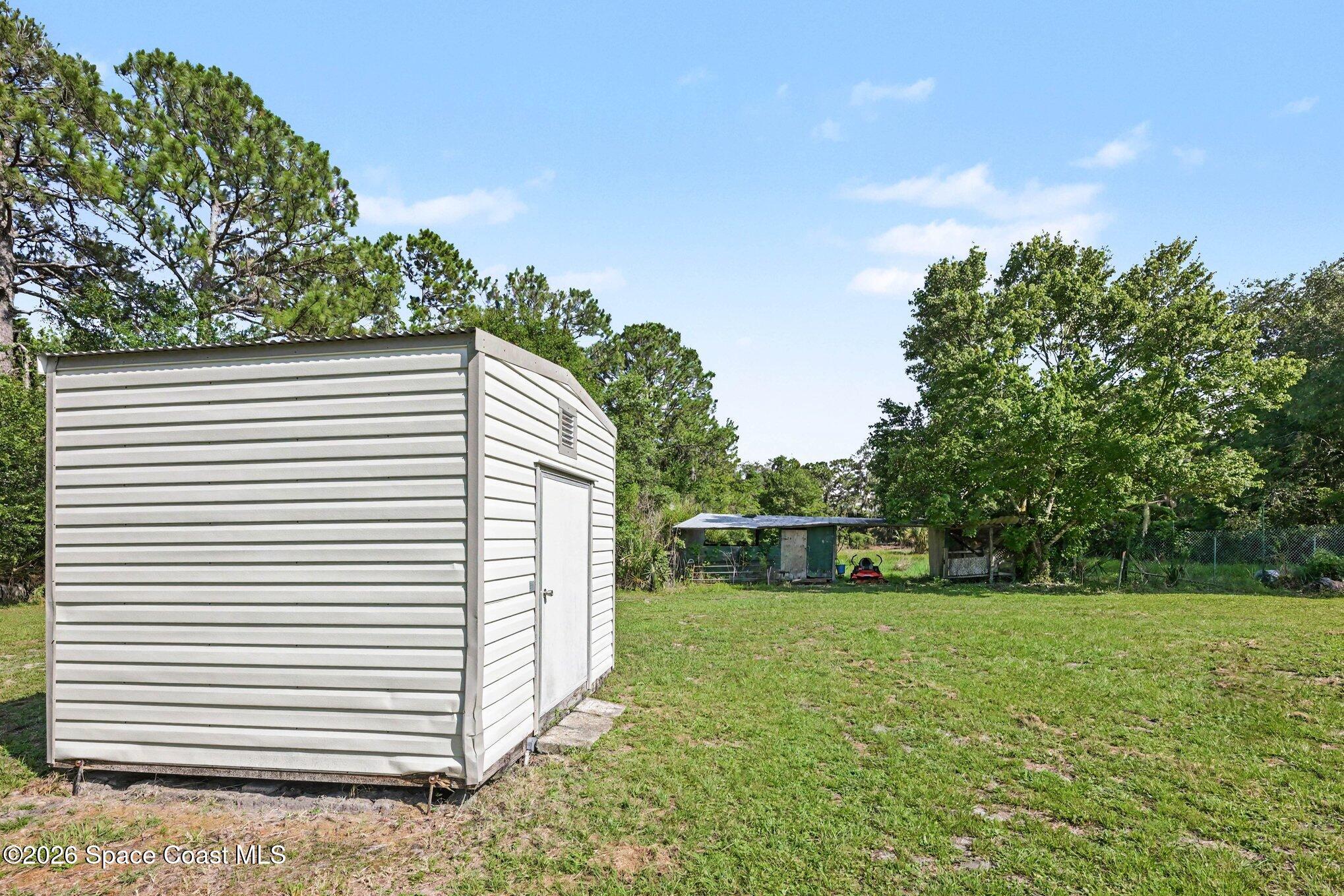 4785 Harrison Road Mims, FL 32754 - Photo 22 of 34 shed