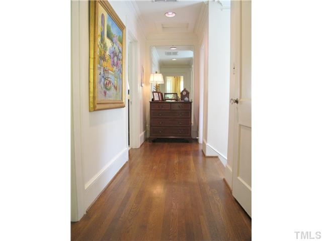 2238 The Circle Raleigh, NC 27608 - Photo 17 of 23 a view of a hallway with wooden floor