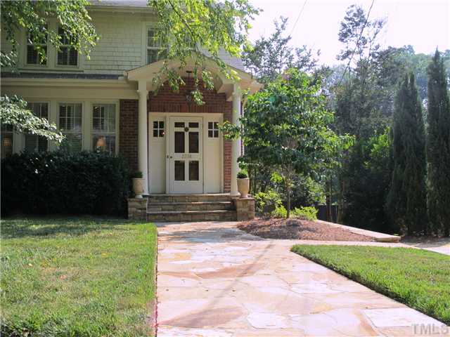 2238 The Circle Raleigh, NC 27608 - Photo 23 of 23 a backyard of a house with yard and outdoor seating