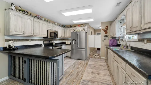 $589,900 | 312 Charger Drive, Macks Creek, MO 65786